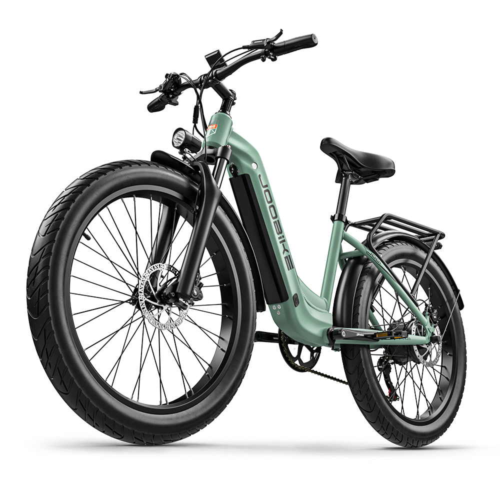 Grünes Elektrofahrrad. Das Fahrrad befindet sich auf einem schwarzen Hintergrund.