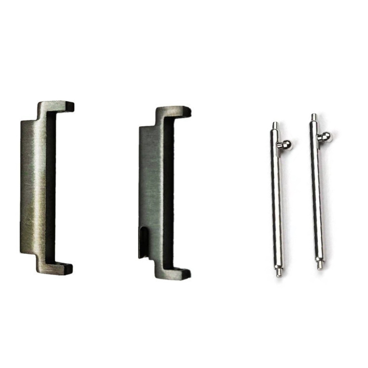 Dwie metalowe części i dwa srebrne pręty. Części metalowe są prostokątne, pręty mają kulkę na jednym końcu.