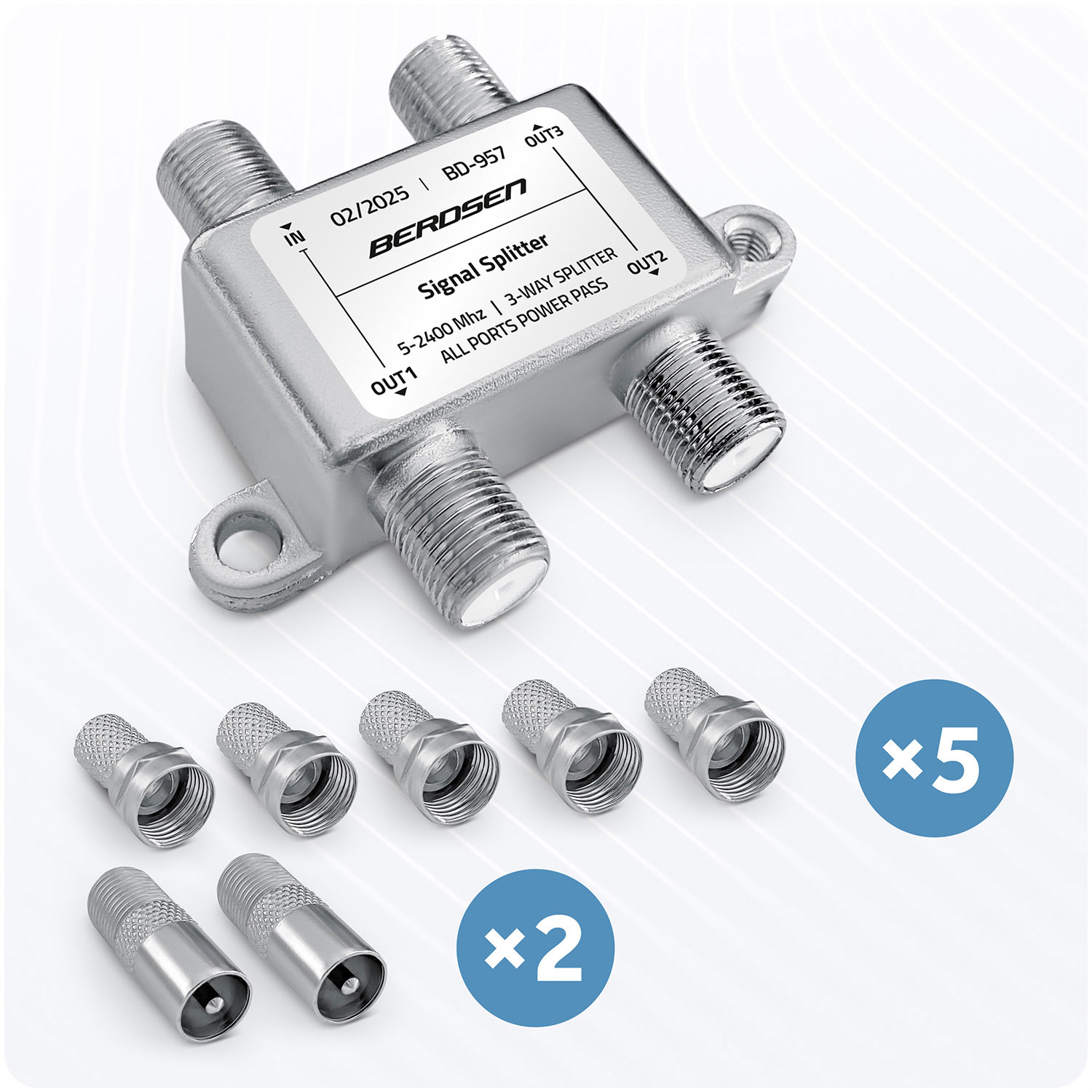 Srebrny rozdzielacz sygnału z wieloma portami i złączami. Zawiera złącza kabli koncentrycznych. Widok z góry.