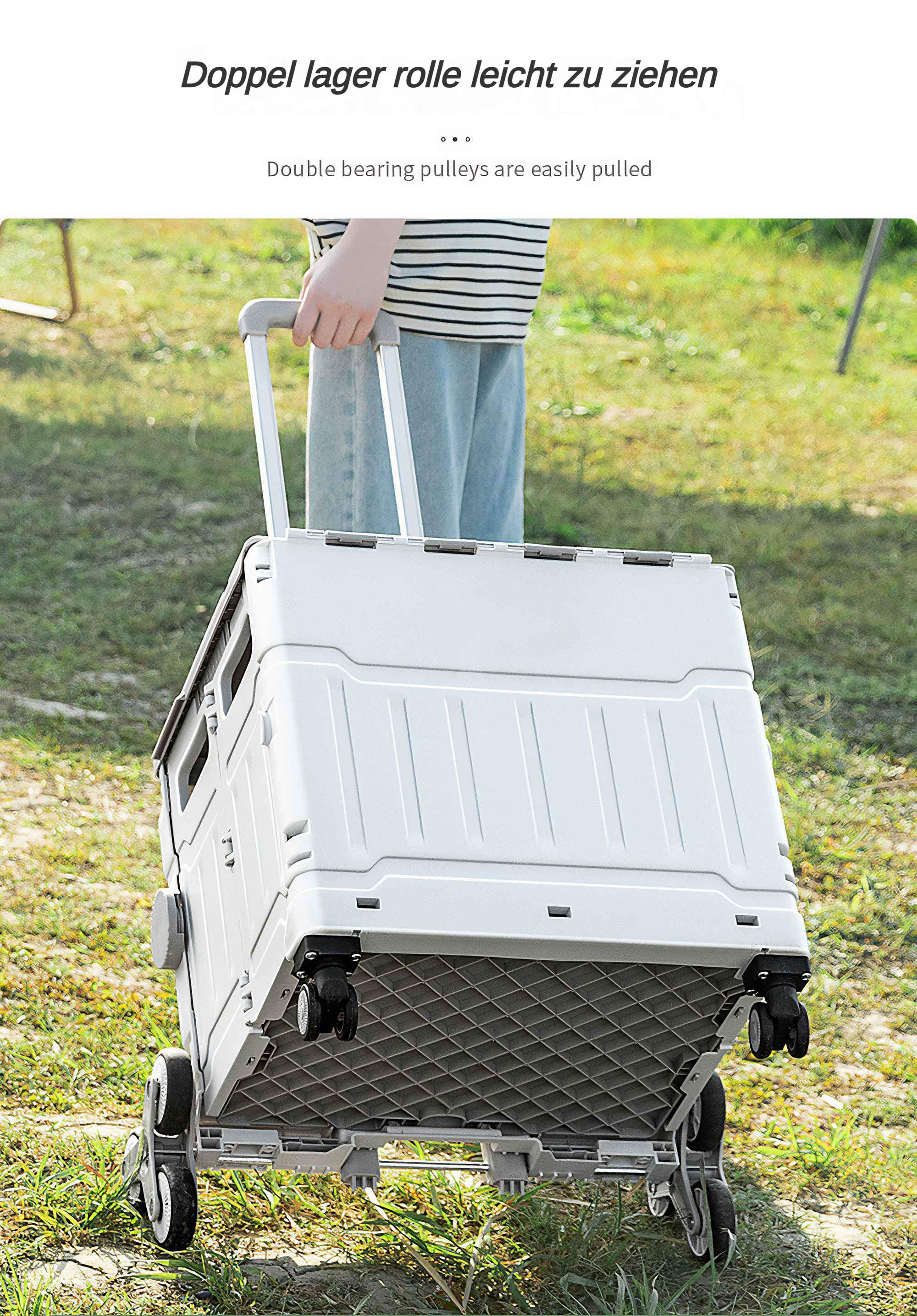 Eine Person zieht einen weißen, faltbaren Wagen auf Rädern mit einem Doppelrollen-Riemensystem.