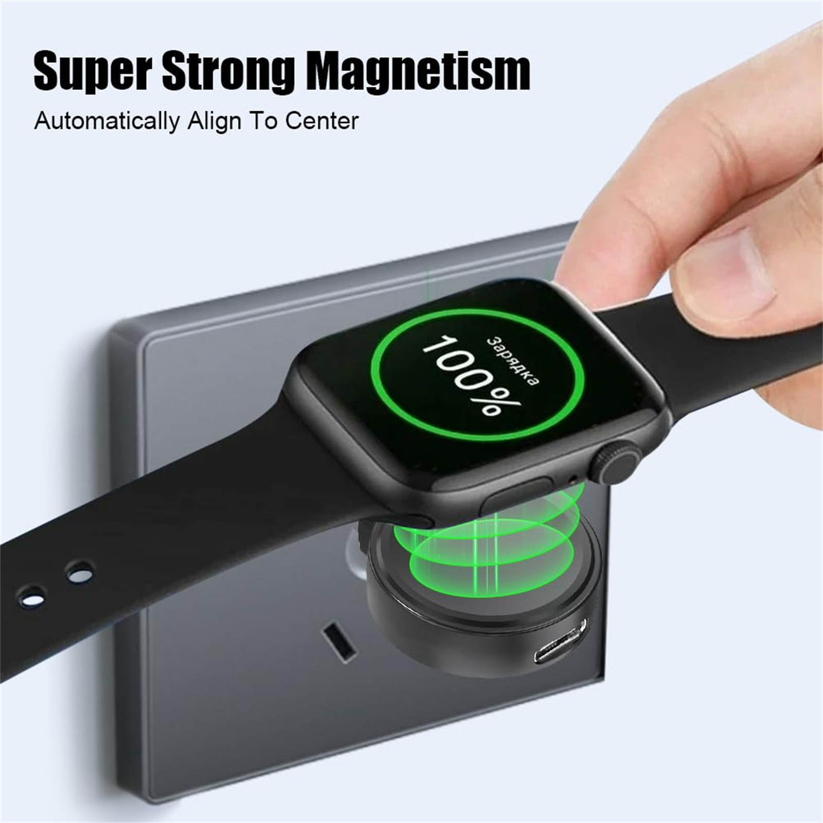 Eine schwarze Smartwatch auf einer Ladestation, zu 100% geladen. Text: 'Super Strong Magnetism'.