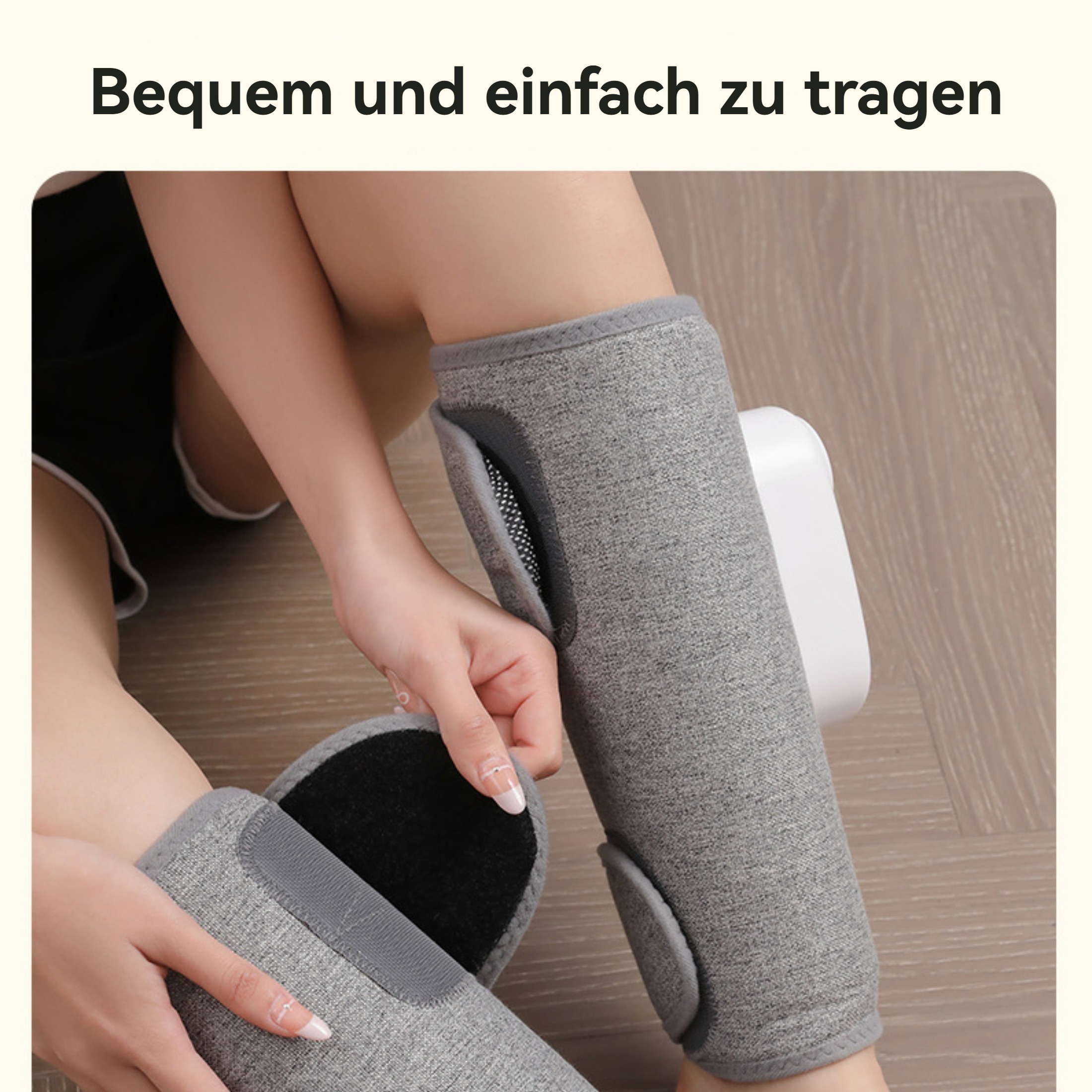 Eine Person legt ein Beinmassagegerät an. Das Massagegerät hat einen Klettverschluss.
