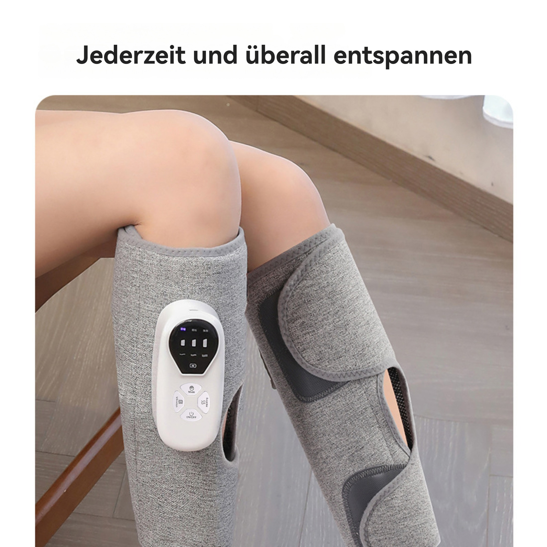 Beine einer Person mit grauen Beinmassagern und einem weißen Bedienfeld.