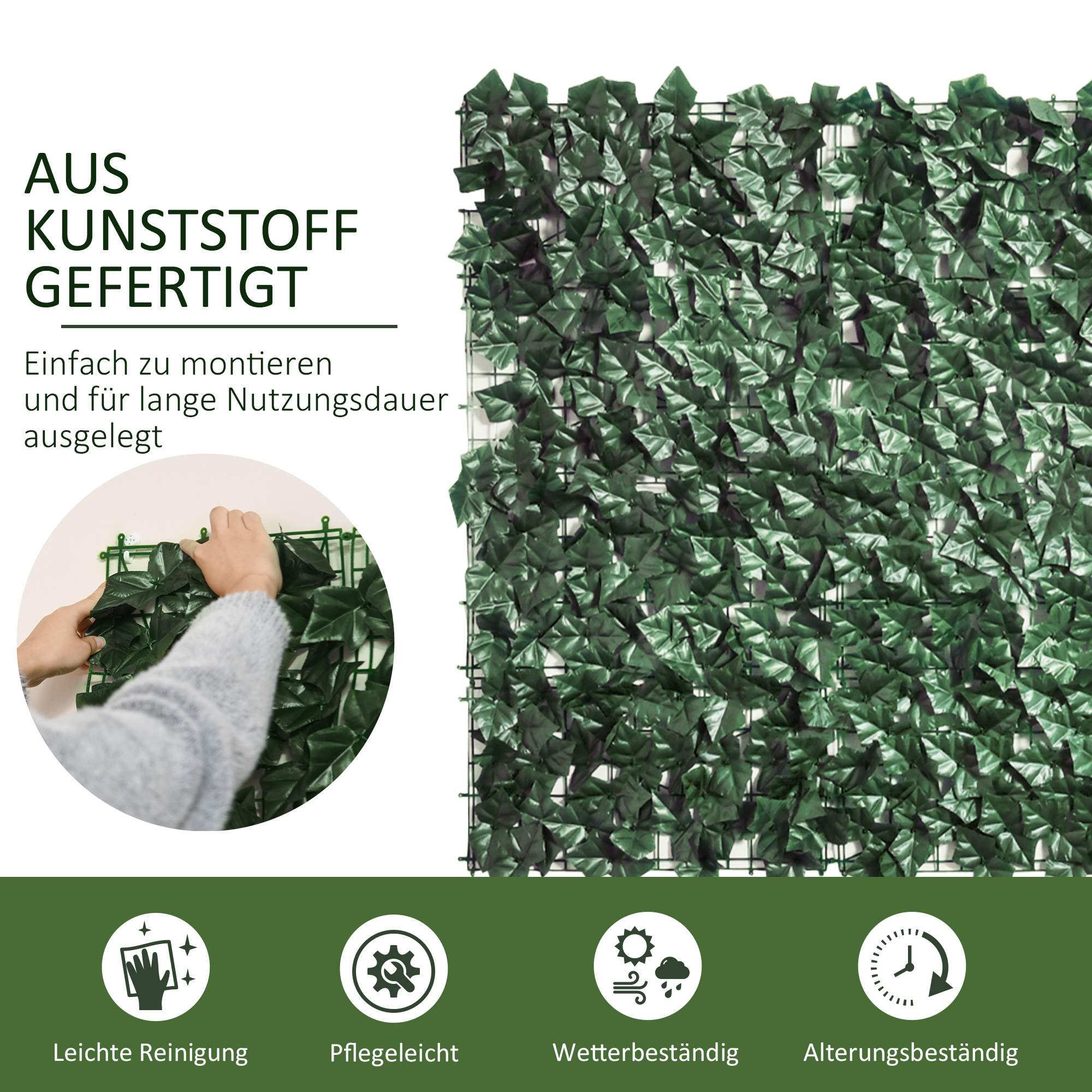 Grüne künstliche Efeuwand. Der Hintergrund ist weiß.