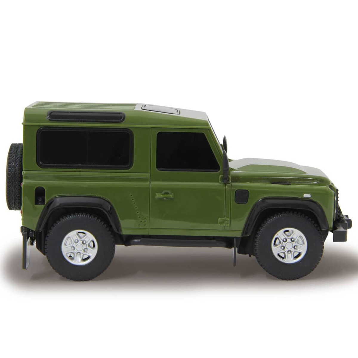 SUV Land Rover Defender de juguete verde sobre fondo blanco. Llantas y ventanas negras.