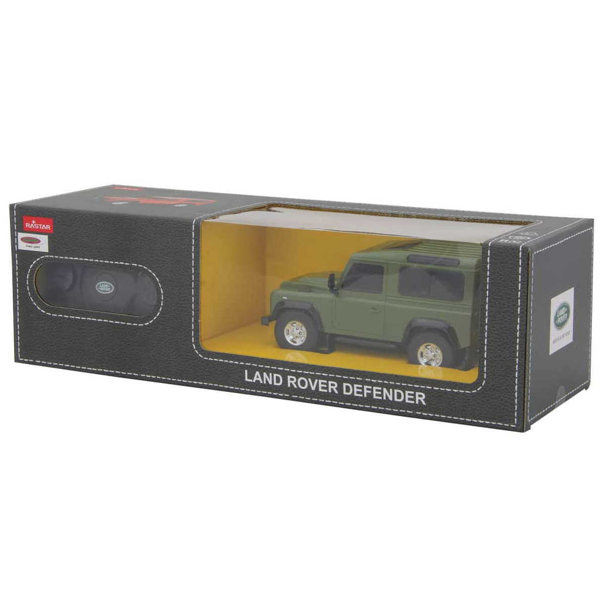 Un juguete Land Rover Defender verde dentro de una caja negra con una ventana transparente. La caja dice 'Land Rover Defender'.