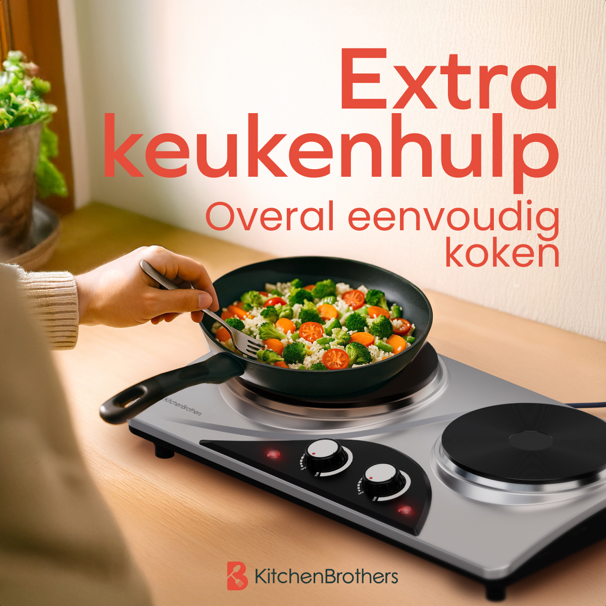 Person using a fork to stir vegetables in a pan on a cooktop. KitchenBrothers brand.