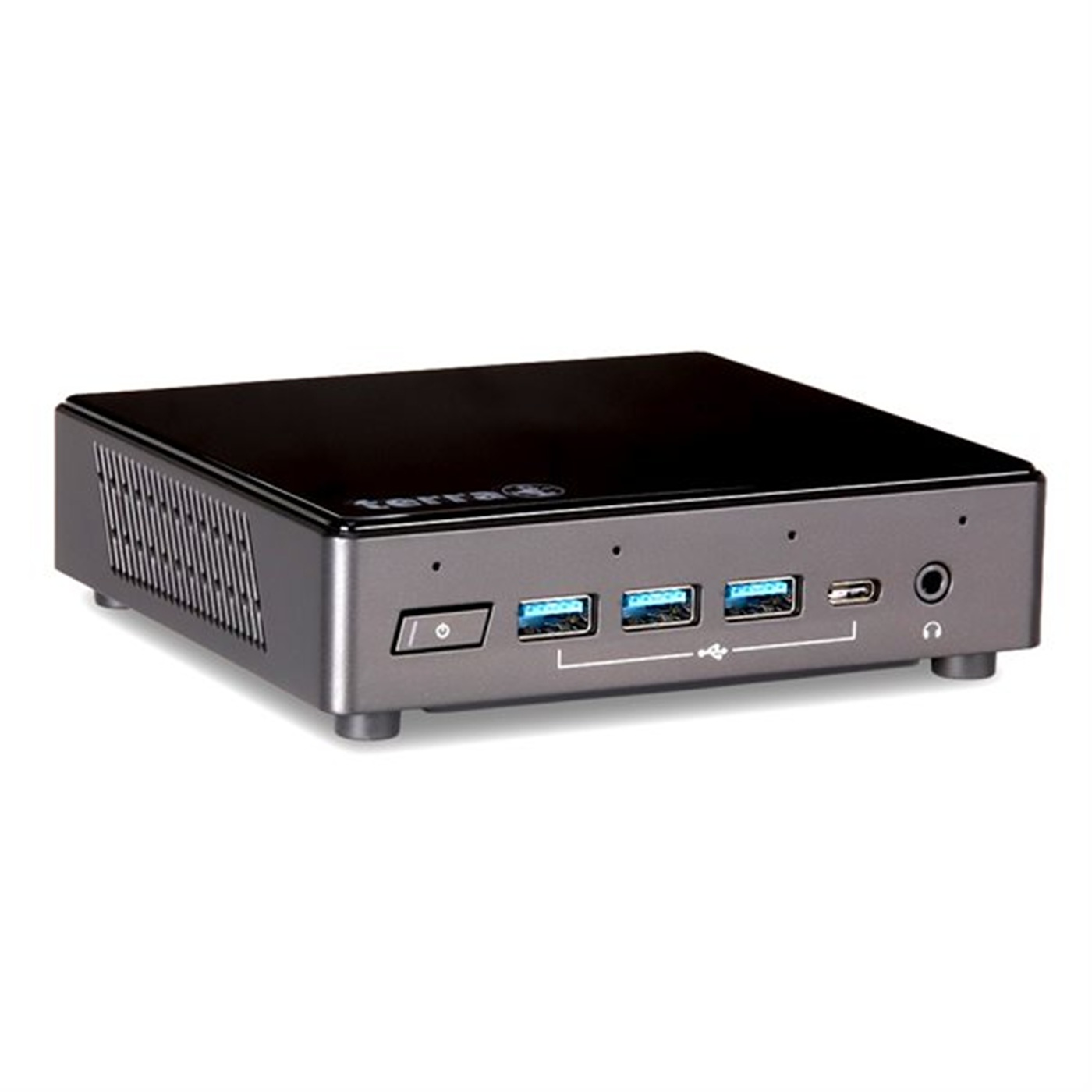 Piccolo computer nero, porte visibili sul davanti. Pulsante di accensione e porte USB.