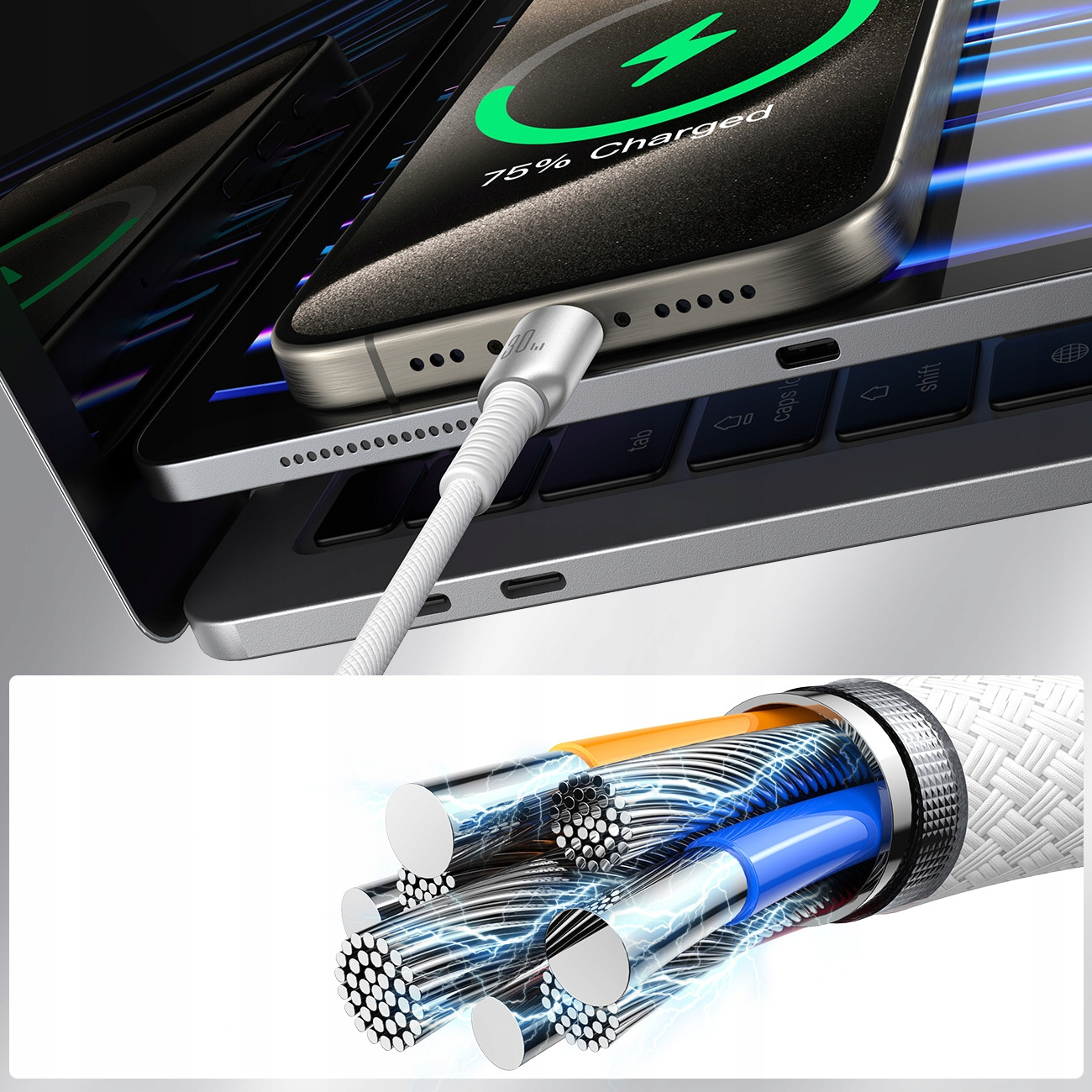 Telefon ładujący się na laptopie, zbliżenie na wewnętrzne przewody kabla.