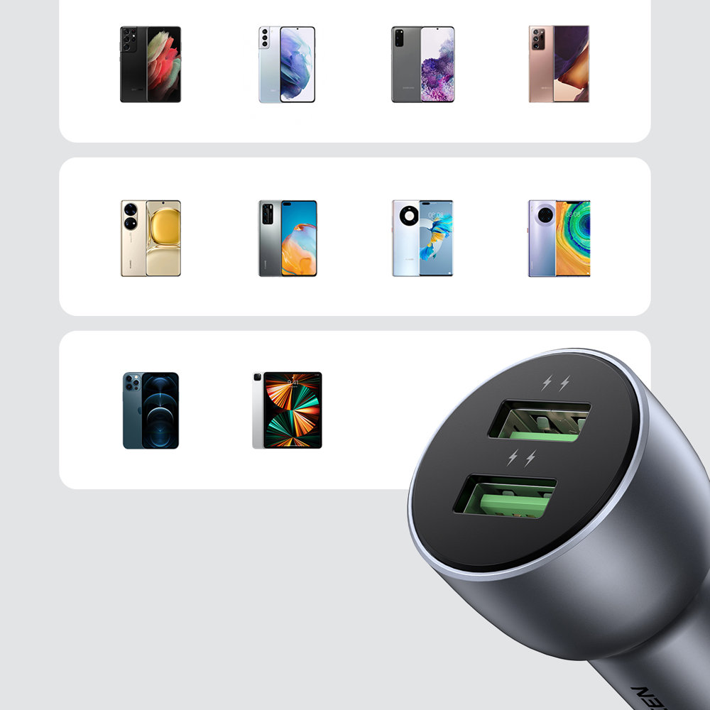 Telefony obok ładowarki samochodowej z dwoma portami USB.