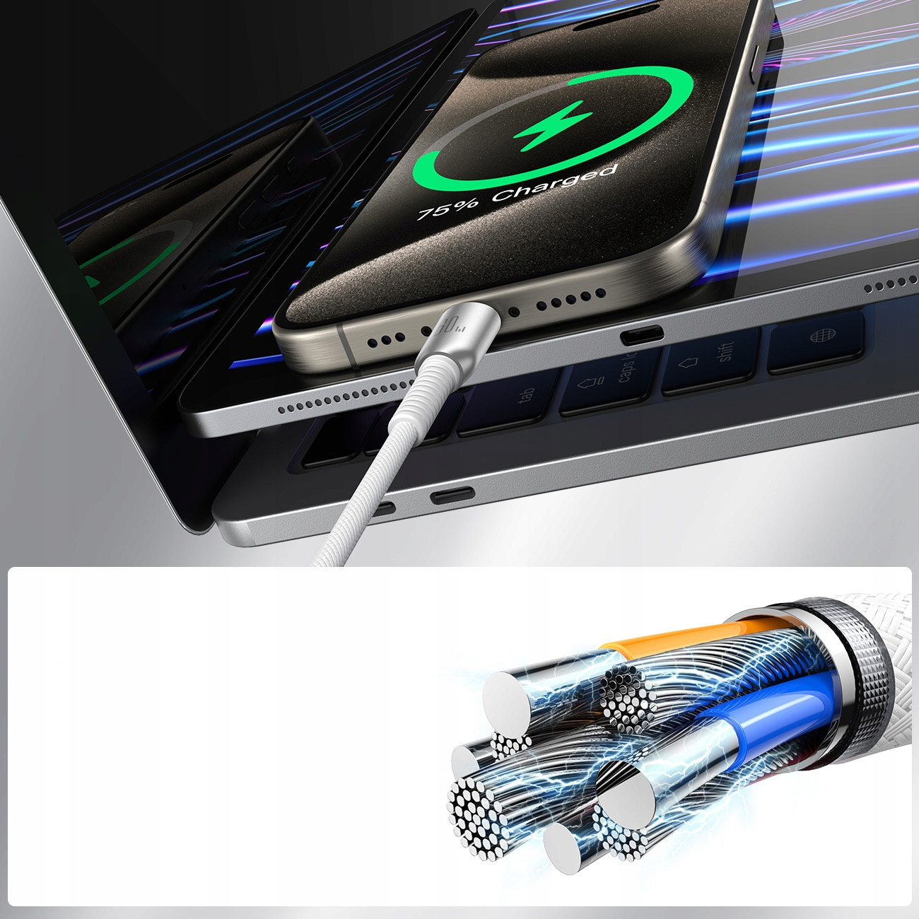 Telefon ładuje się na laptopie. Kabel jest podłączony. Kabel pokazuje wewnętrzne przewody.