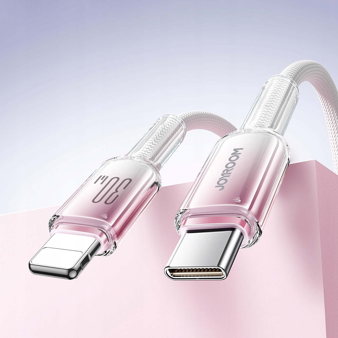 Ein Ladekabel mit Lightning- und USB-C-Anschluss, beide rosa. Das Kabel ist weiß.