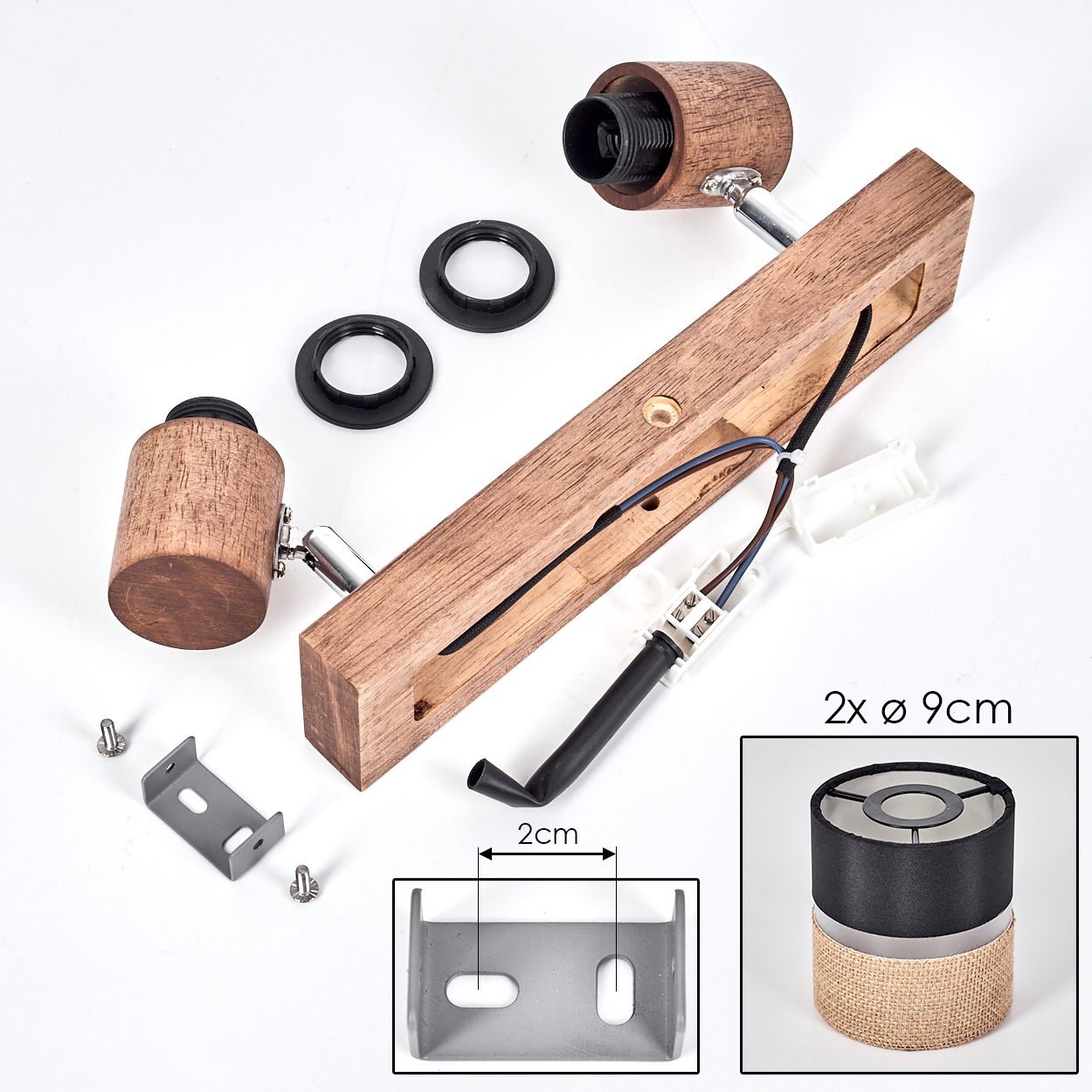Zerlegte Lampenteile: Holzsockel, Metallhalterung, schwarz-weiße Drähte und Schirm.