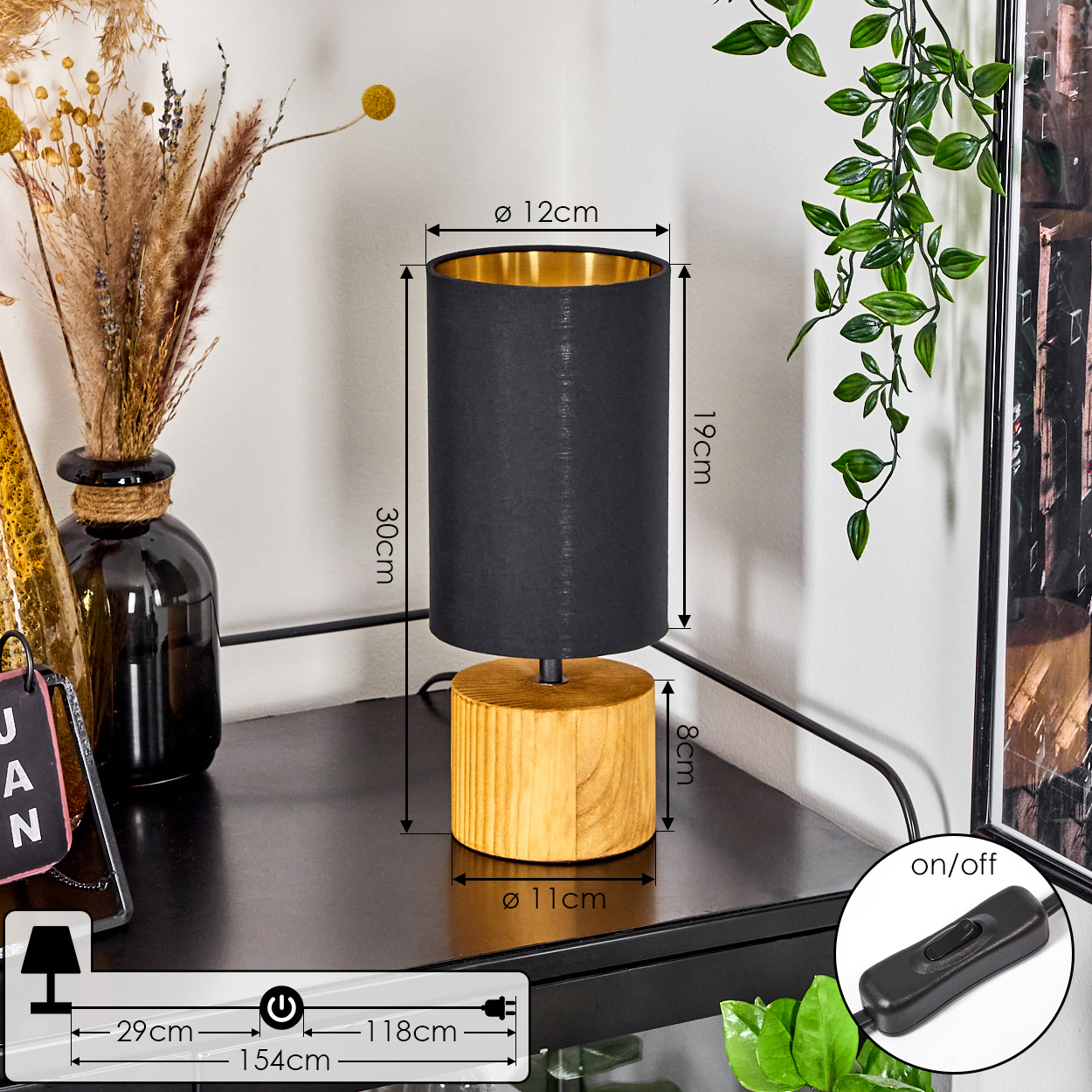Schwarz-weiße Tischlampe mit Maßen. Ein schwarzer Ein/Aus-Schalter ist ebenfalls vorhanden.