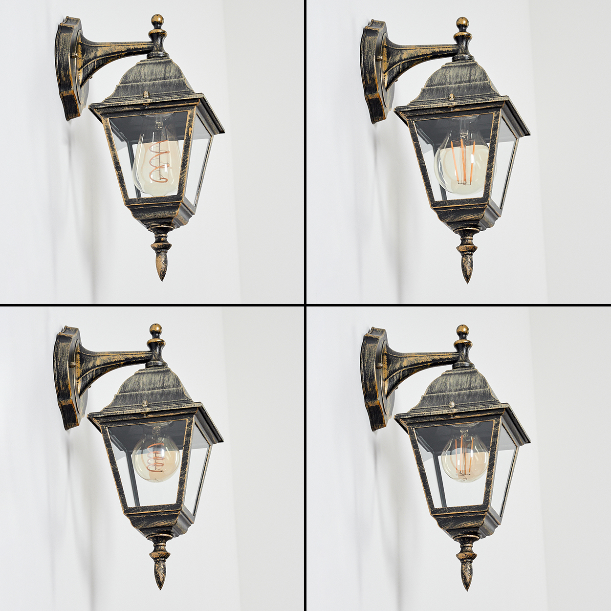 Vier Wandlampen, jede mit einem Glasgehäuse und einem Vintage-Design. Die Lampen sind an einer weißen Wand.