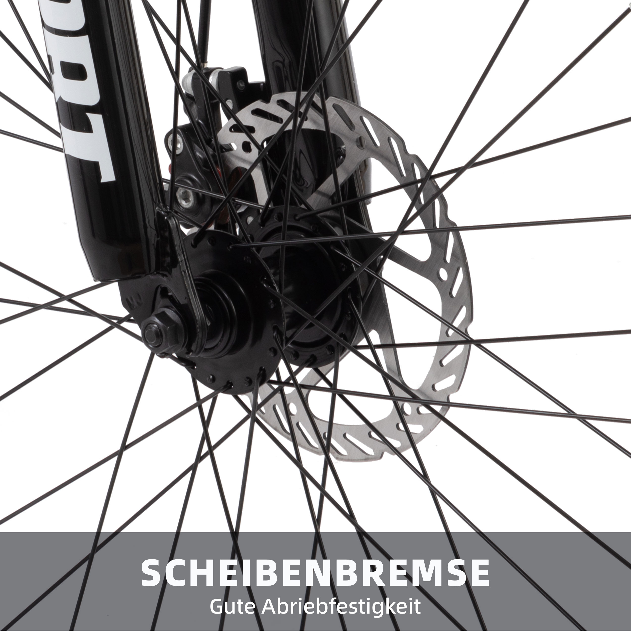 Nahaufnahme einer Scheibenbremse an einem Fahrradrad. Drähte, Speichen und eine schwarze Bremse sind sichtbar. Die Scheibe ist silberfarben.