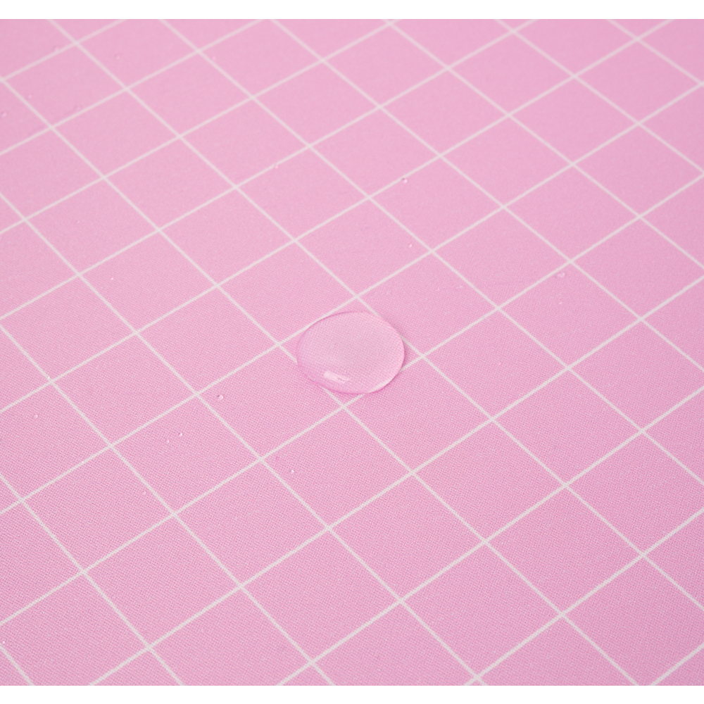 Rosa Mousepad mit Gittermuster und einem Wassertropfen in der Mitte.