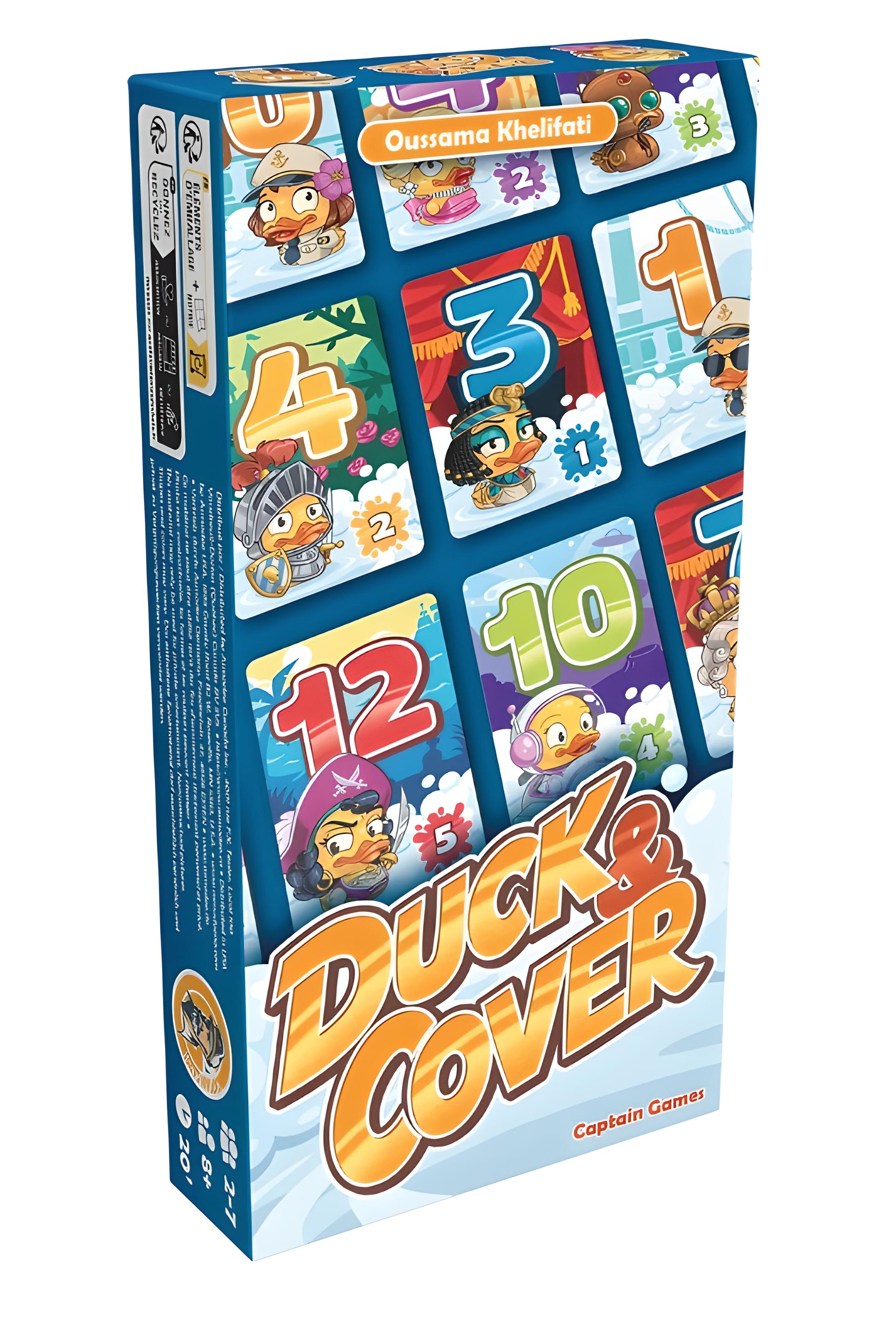 Ein Brettspielkarton mit dem Titel 'Duck & Cover' mit Cartoon-Enten auf nummerierten Karten. Die Box ist weiß.