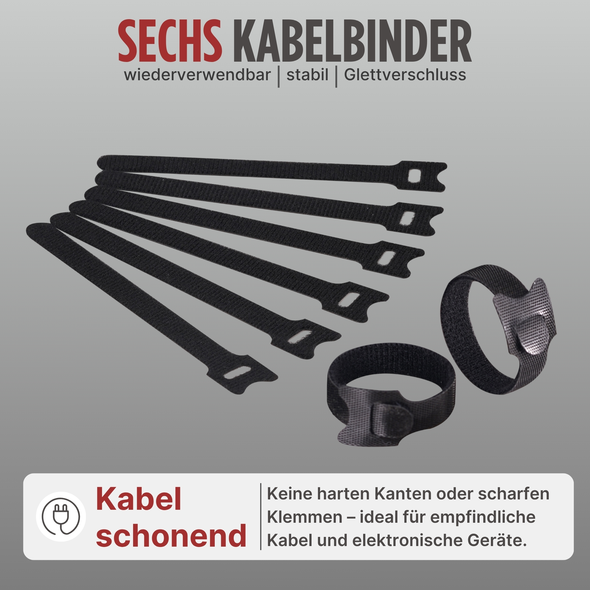 Schwarze Kabelbinder sind auf einer grauen Oberfläche angeordnet. Die Binder haben eine Schlaufe und einen Verschluss.