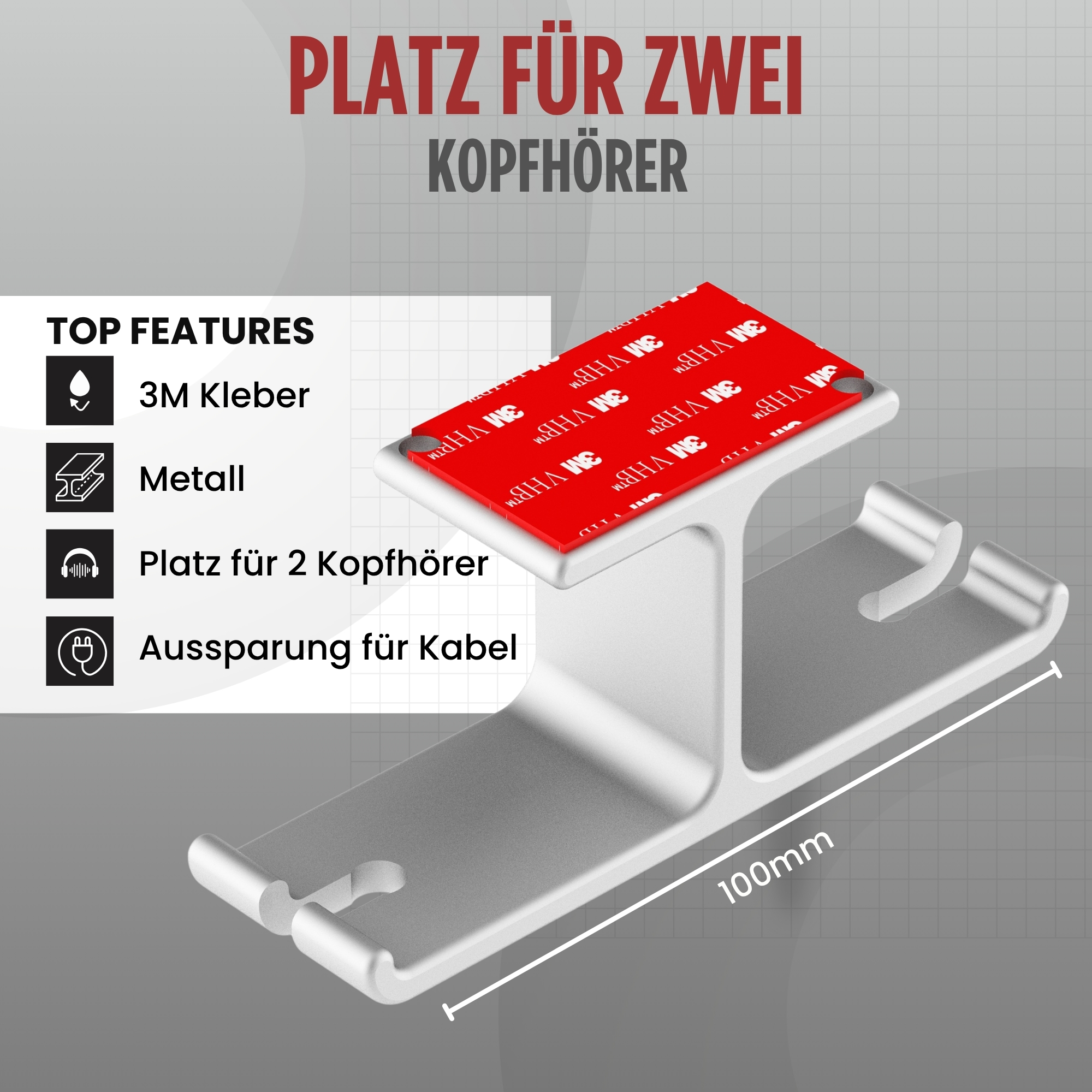Ein silberner Kopfhörerständer aus Metall mit 3M-Kleber, mit einem Kabelausschnitt und Platz für zwei Kopfhörer.