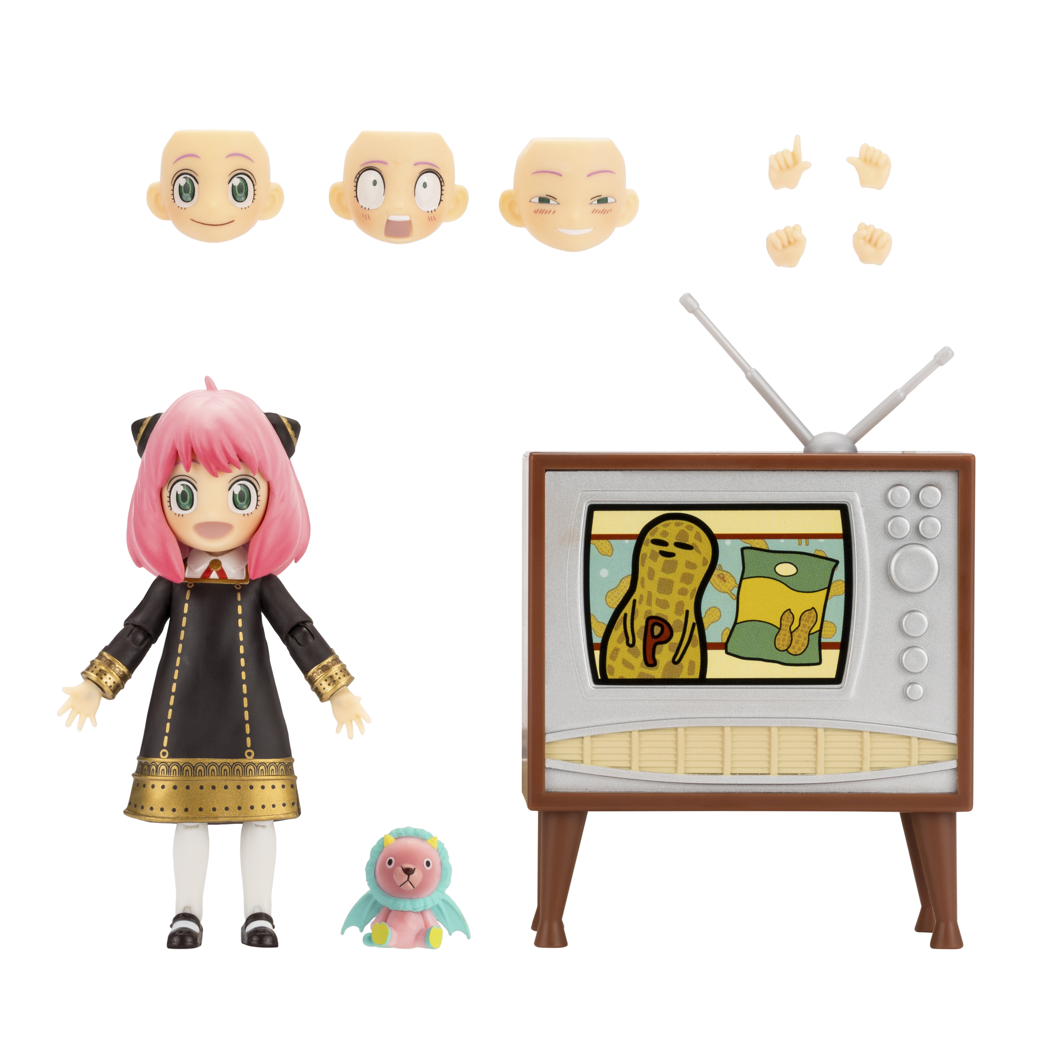 Anya Forger Figur mit TV und Zubehör. Die Figur befindet sich auf weißem Hintergrund. Der Fernseher ist auch ein Spielzeug.