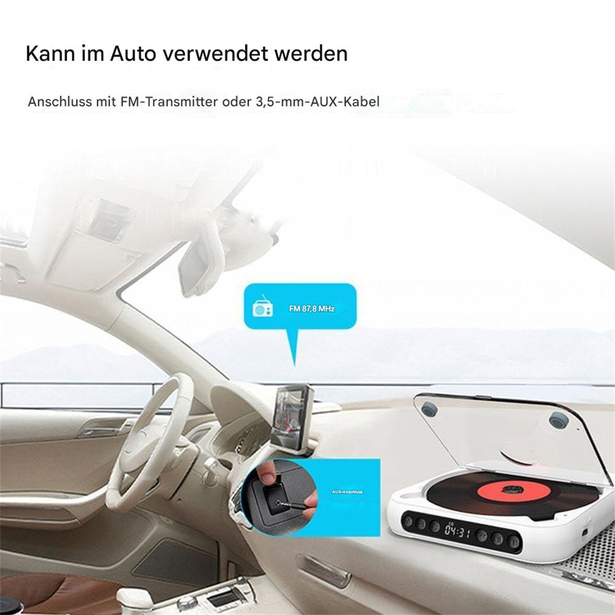 Ein weißer tragbarer CD-Player im Armaturenbrett eines Autos mit AUX-Kabel.