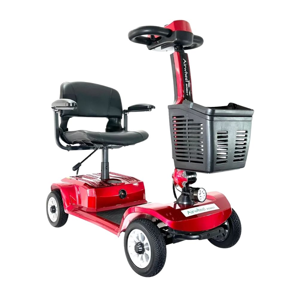 Scooter de movilidad rojo con asiento negro, cesta y cuatro ruedas.