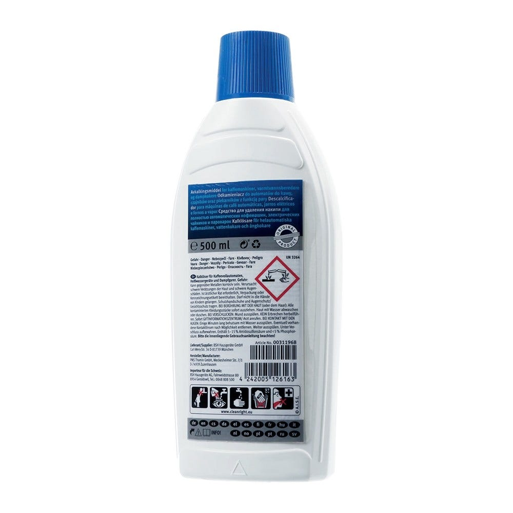 Weiße Flasche mit blauem Deckel, Textetiketten und 500 ml Fassungsvermögen.