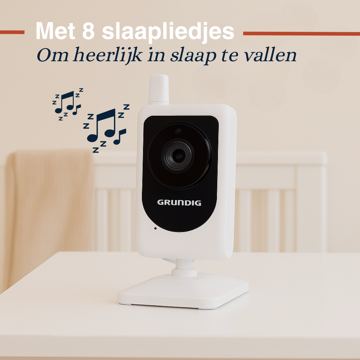 A baby monitor with a screen displaying musical notes, with the word GRUNDIG on it.