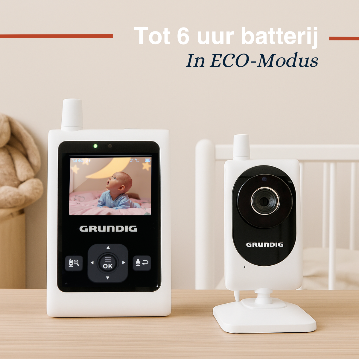 Two white baby monitors, one with a screen showing a baby, with text about battery life.