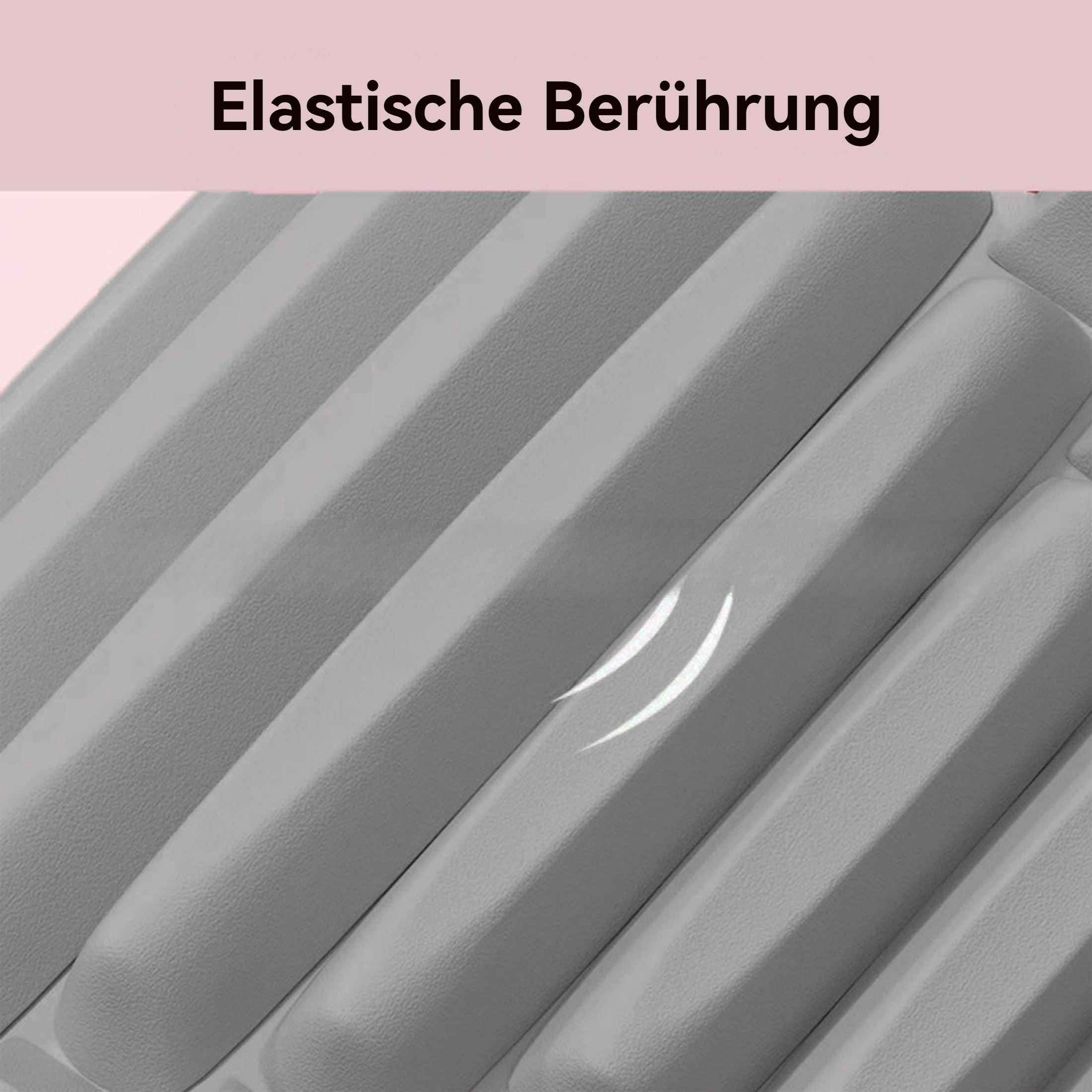 Nahaufnahme einer grau strukturierten Oberfläche mit dem Text Elasitische Berührung darüber. Sieht nach Massagegerät aus.