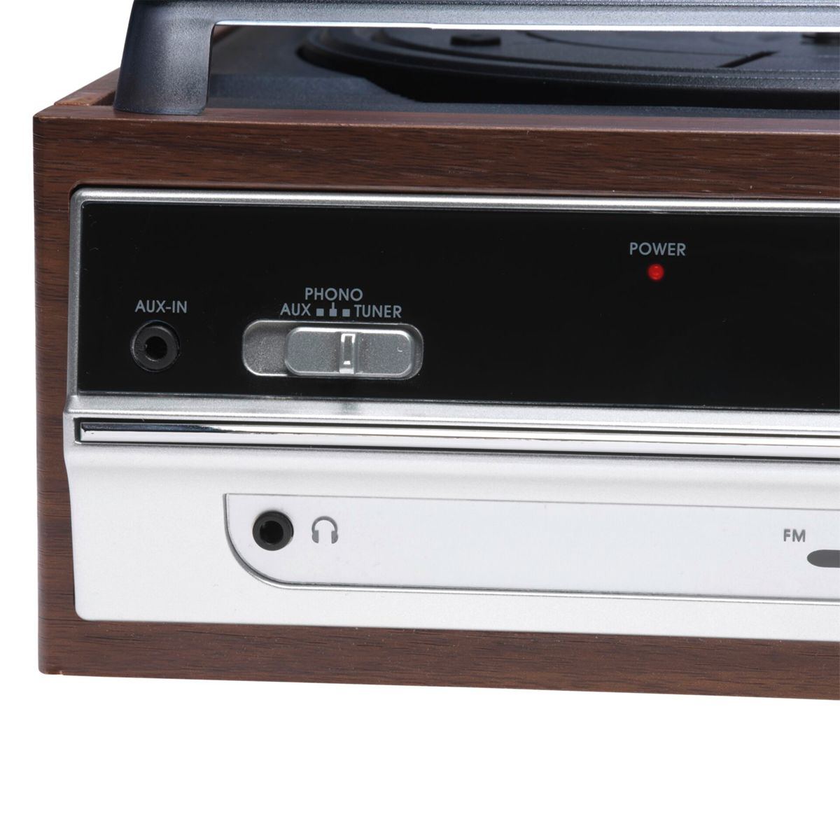 Zbliżenie gramofonu w stylu vintage, z elementami sterowania dla aux-in, phono i zasilania.