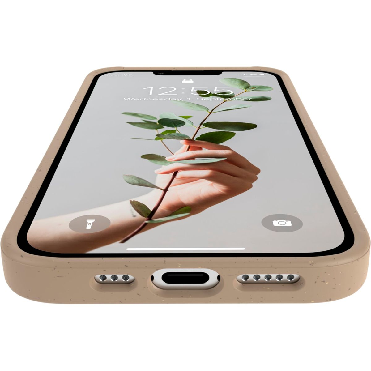 Ein Telefon zeigt eine Hand, die eine Pflanze hält. Das Telefon ist in einer braunen Hülle.