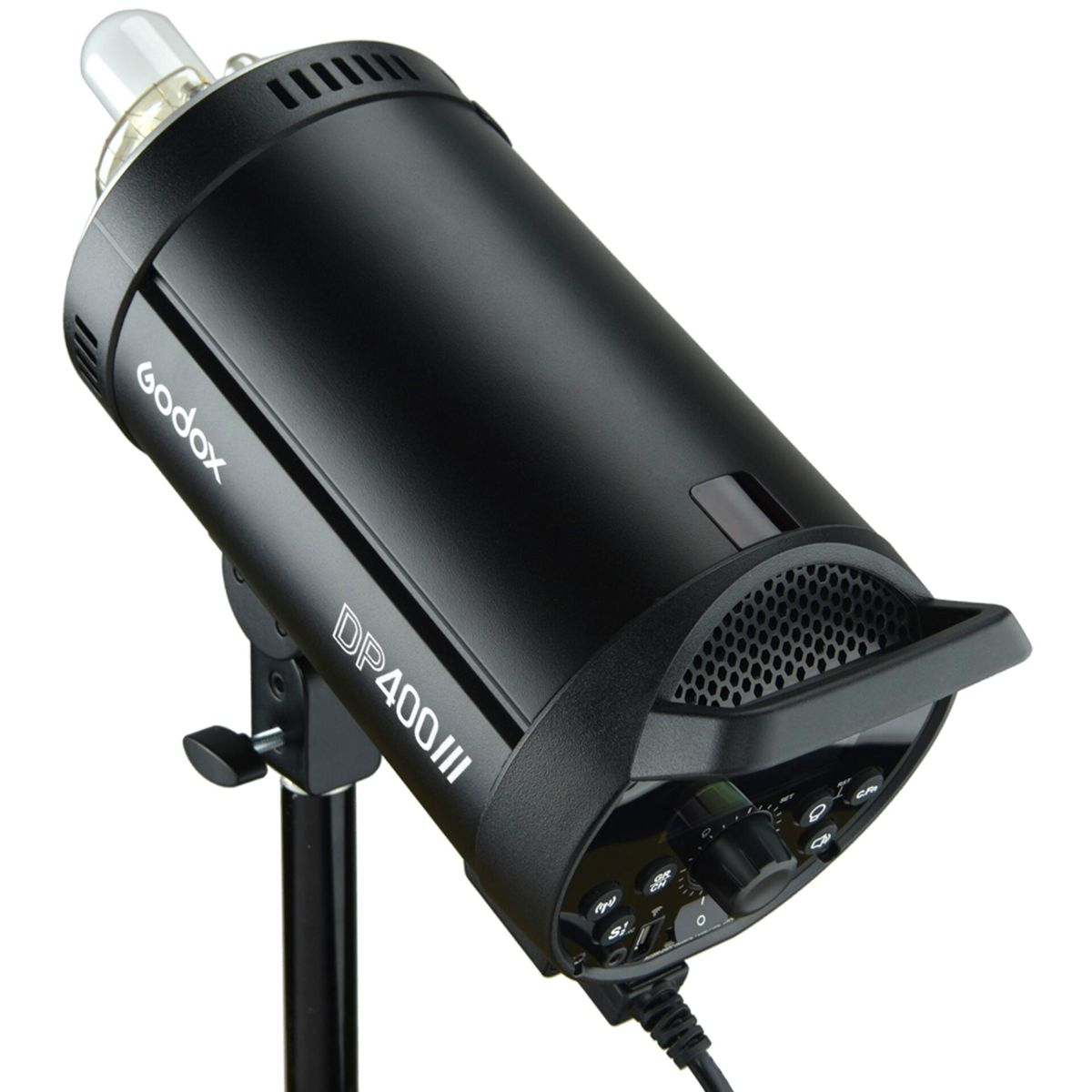 Flash da studio nero Godox DP400III su supporto, angolato. Mostra i comandi e una lampada flash.