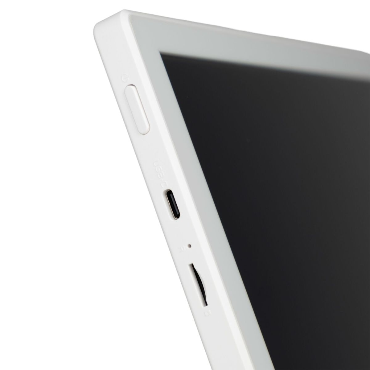 Gros plan sur une tablette blanche avec un écran noir. Le côté comporte des boutons et des ports.