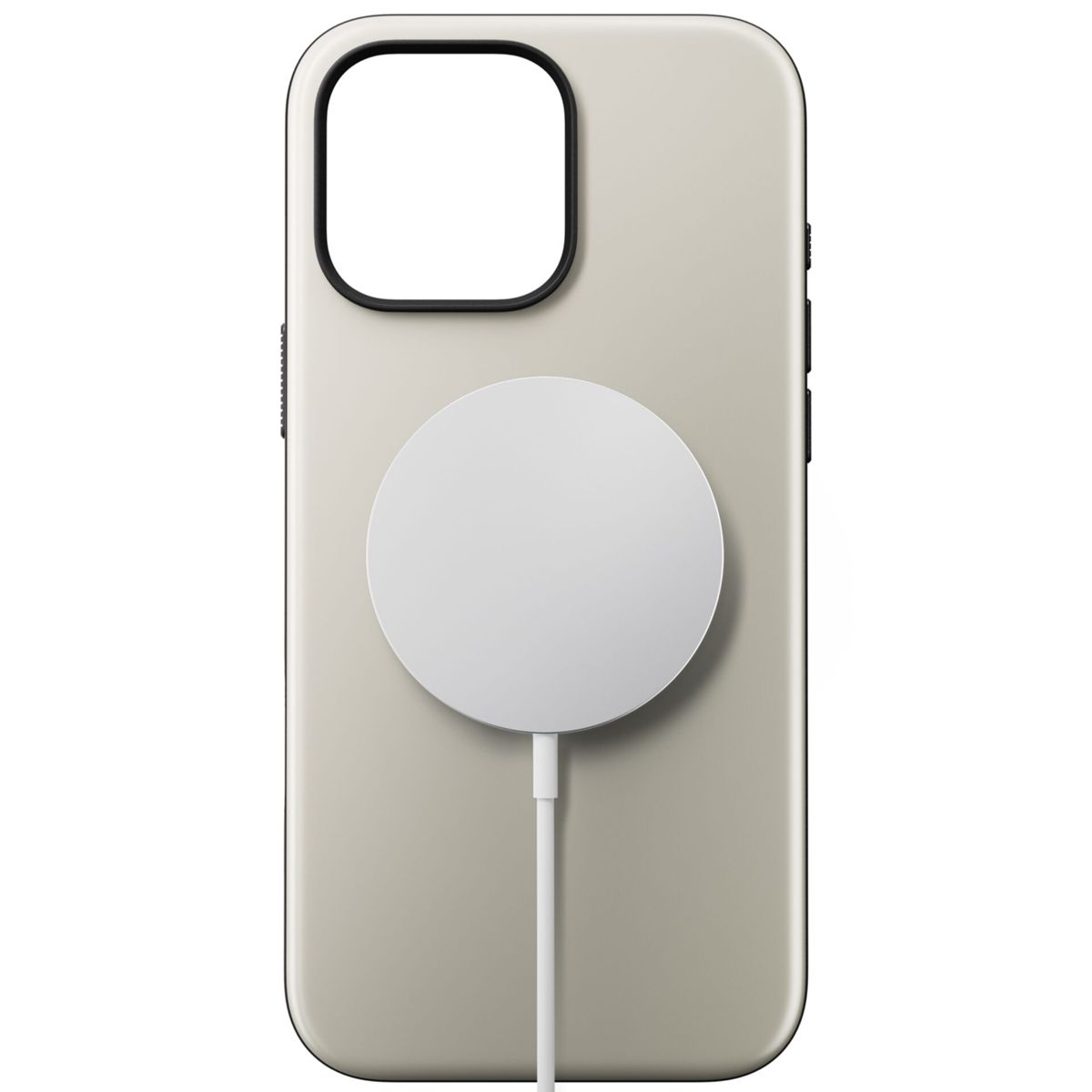 Un iPhone in una custodia, con un caricatore circolare bianco e un cavo bianco.