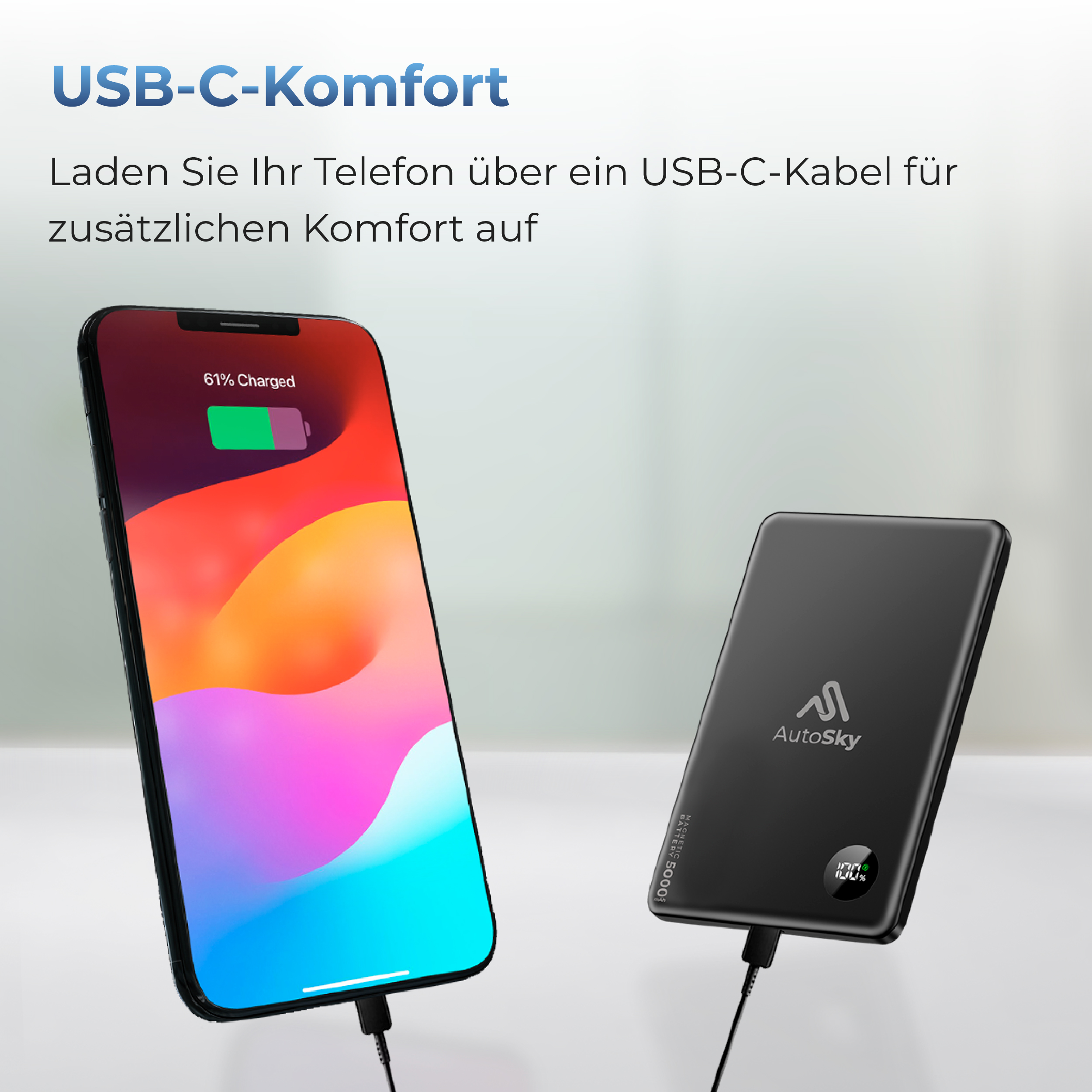 Un teléfono cargando con un power bank. El teléfono muestra una pantalla colorida, el power bank es negro.