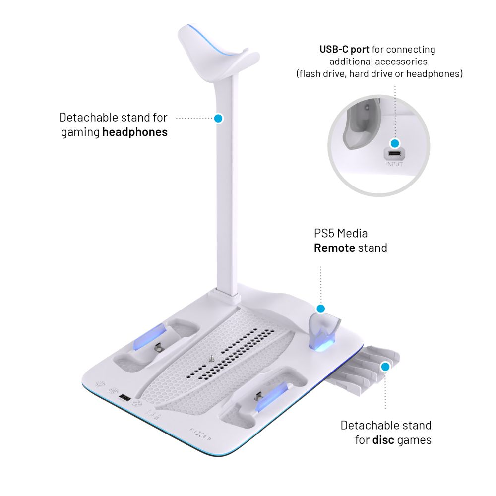 Un supporto bianco per accessori da gaming, con luci. Ha slot per controller e giochi.