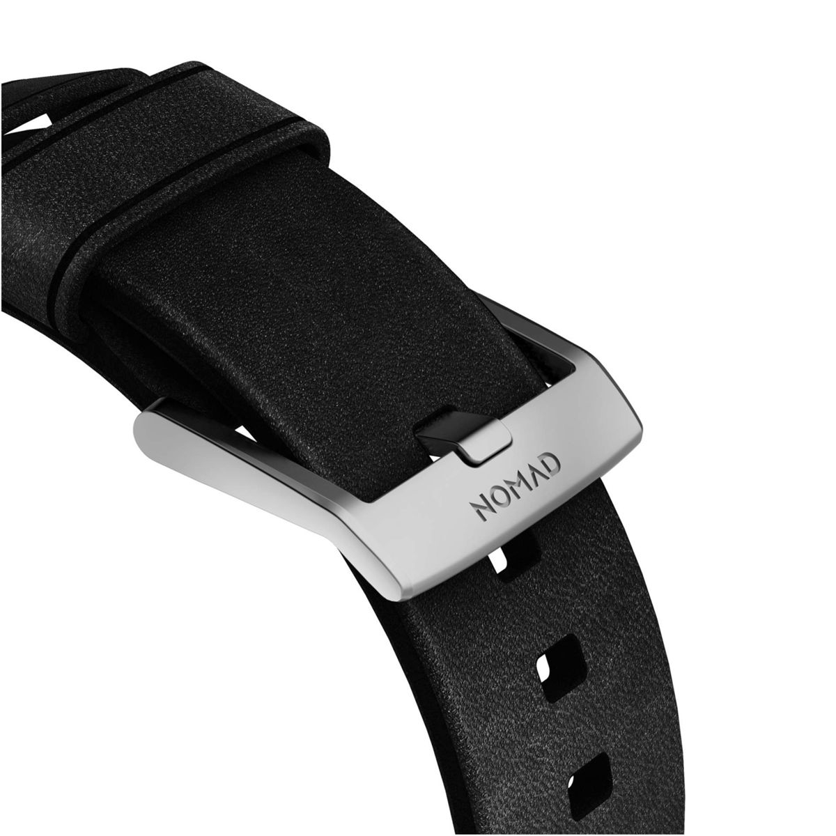 Nahaufnahme eines schwarzen Uhrenarmbands mit silberner Schnalle.