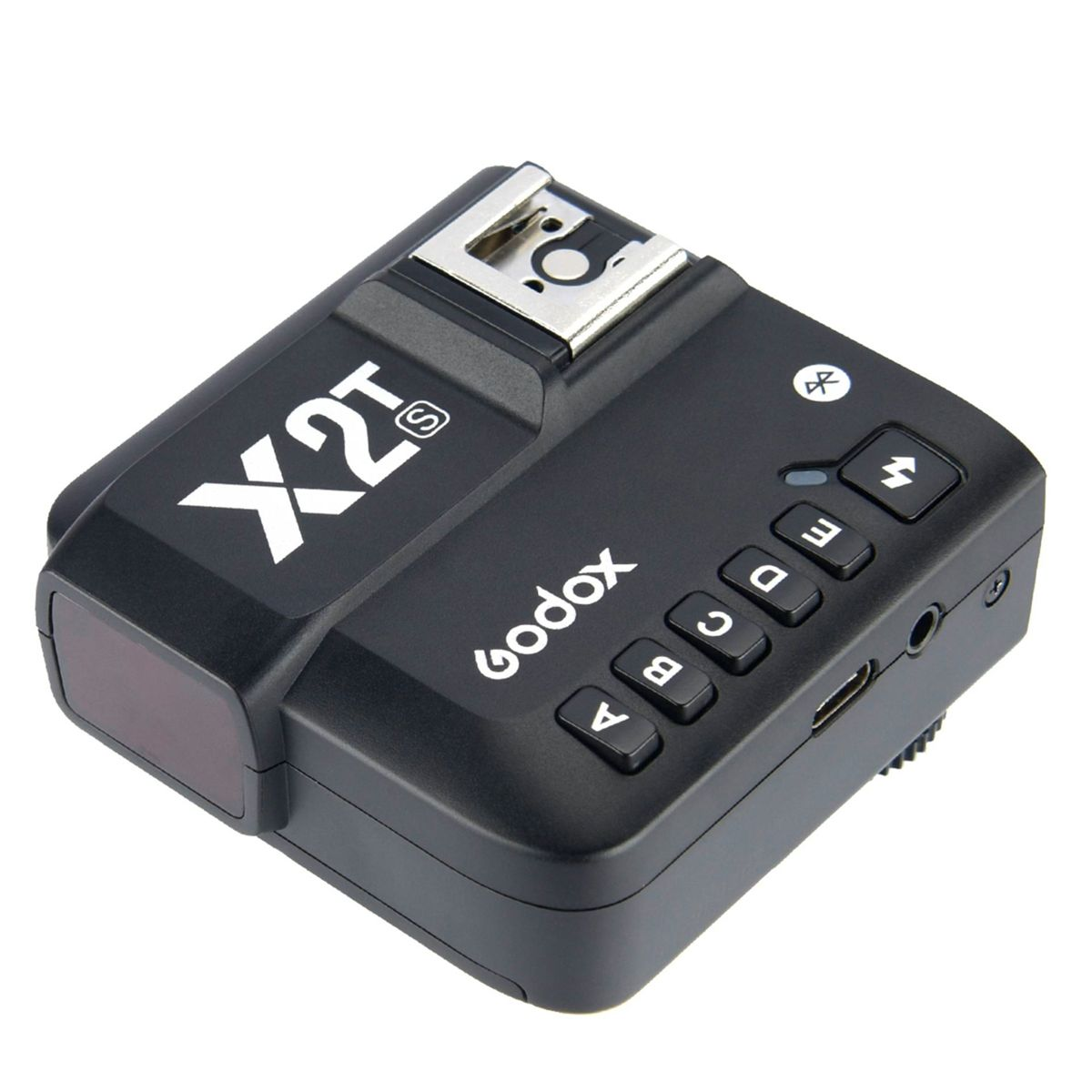 Disparador de flash Godox X2T-S negro con botones y pantalla, sobre fondo blanco.
