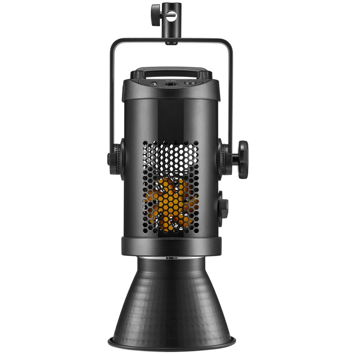 Lumière de studio noire avec une poignée, des évents et un réflecteur conique. La lumière est sur un support.