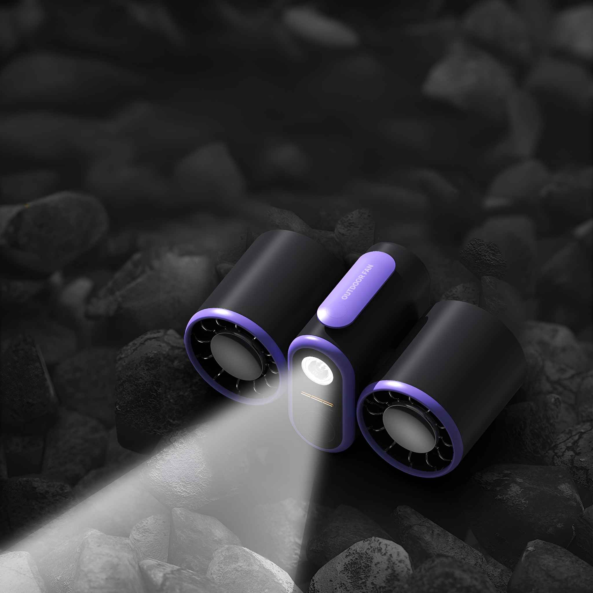 Drei schwarz-violette Outdoor-Ventilatoren mit Spotlight und Licht. Die Ventilatoren befinden sich auf Felsen.