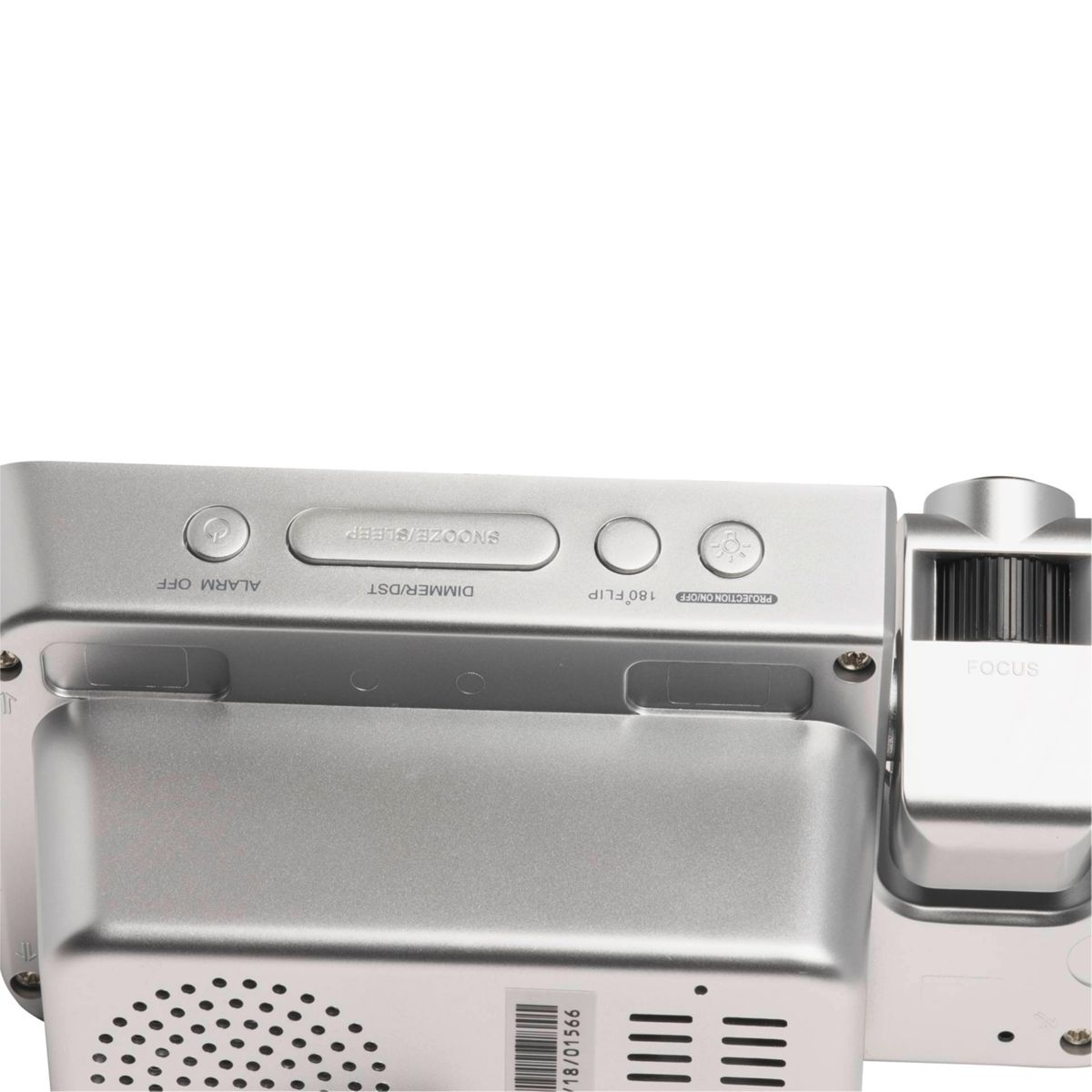 Top view of a silver alarm clock with buttons for alarm off, snooze/sleep, and dimmer/DST.