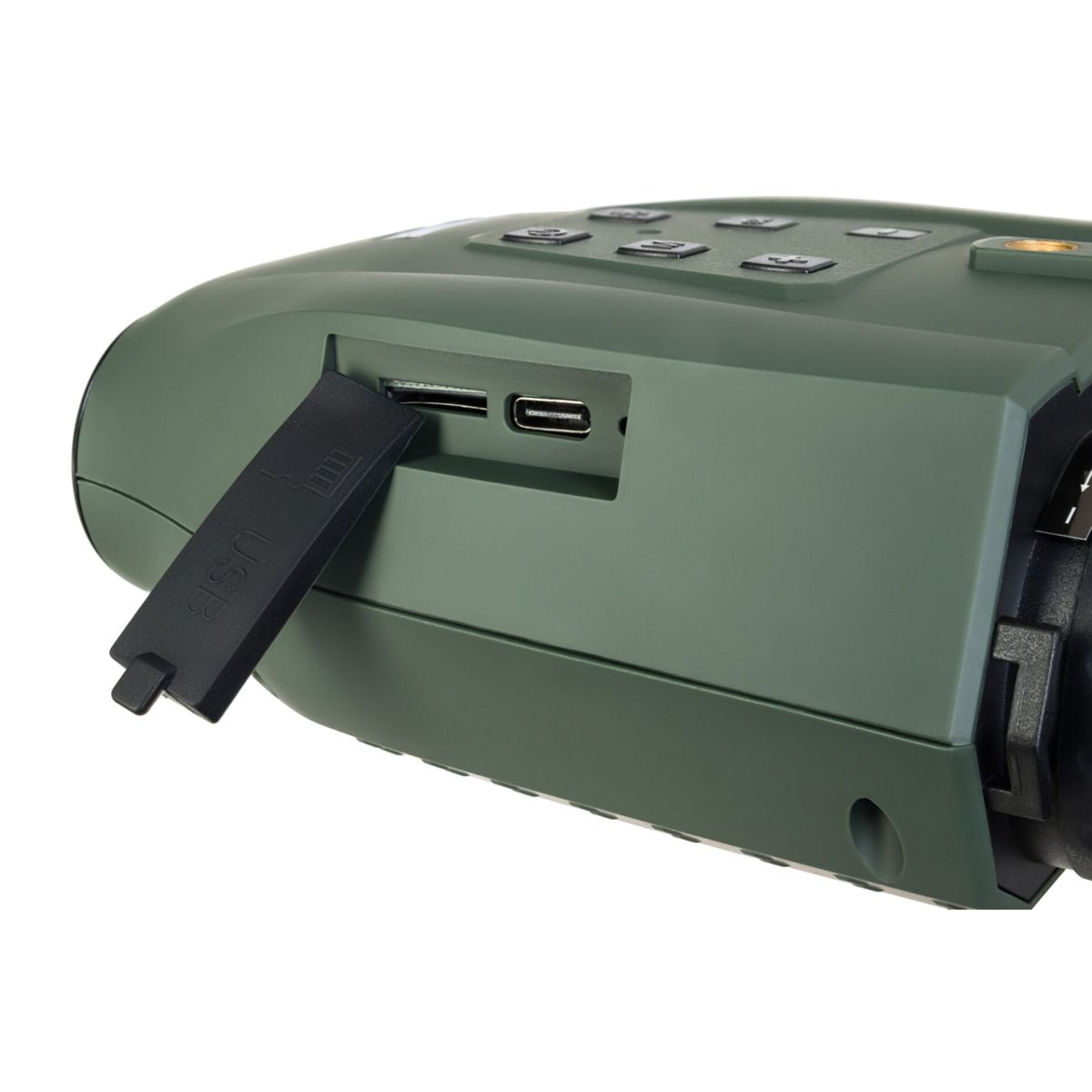 Primo piano di un dispositivo verde scuro con porta USB aperta. Il dispositivo ha pulsanti in alto e un obiettivo.