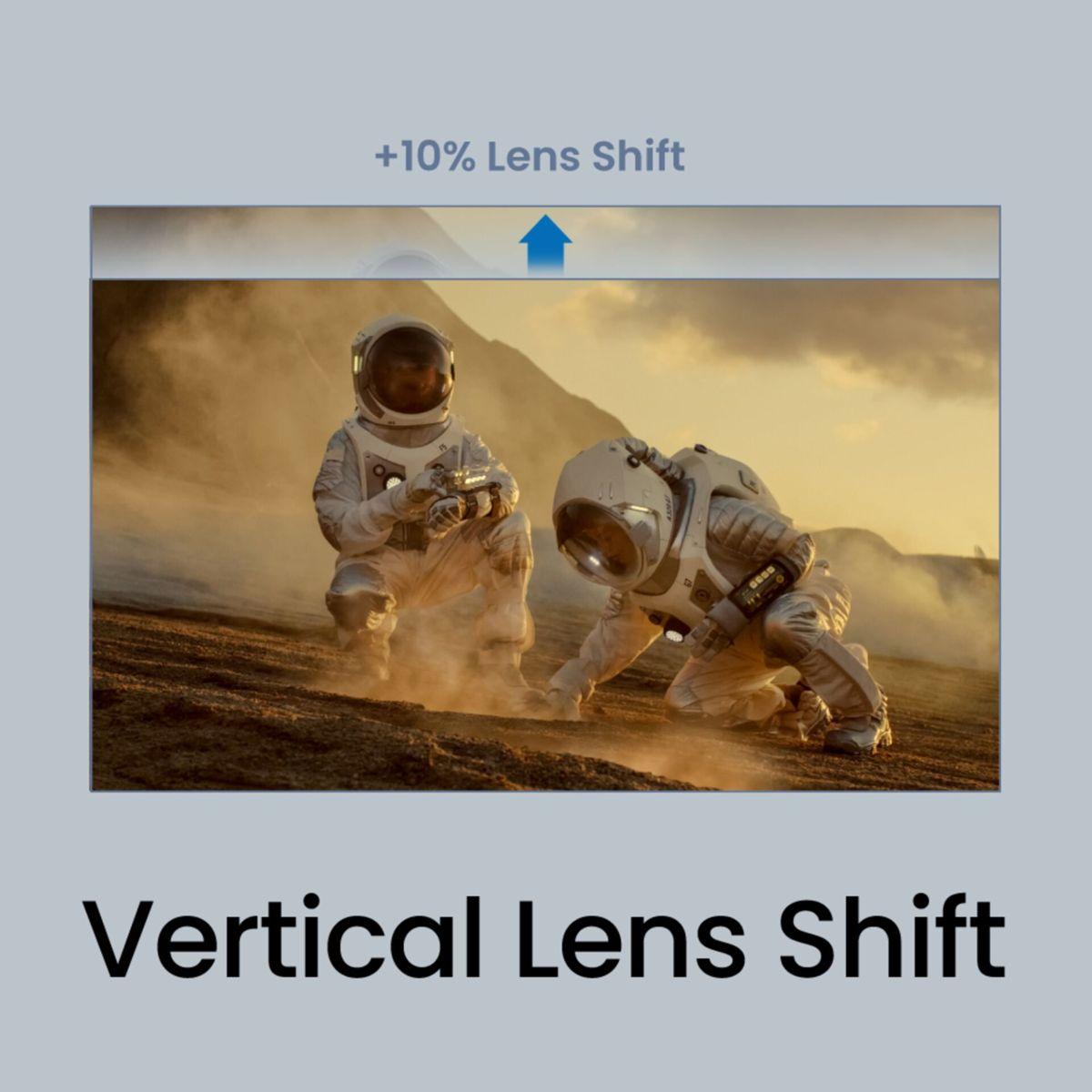 Dwóch astronautów w skafandrach na zakurzonej planecie, z tekstem o przesunięciu obiektywu.