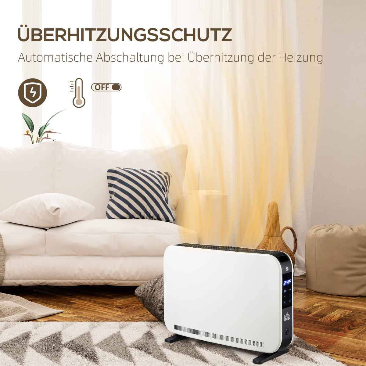 Ein Heizgerät in der Nähe eines weißen Sofas. Es hat eine digitale Anzeige und eine Sicherheitswarnung.