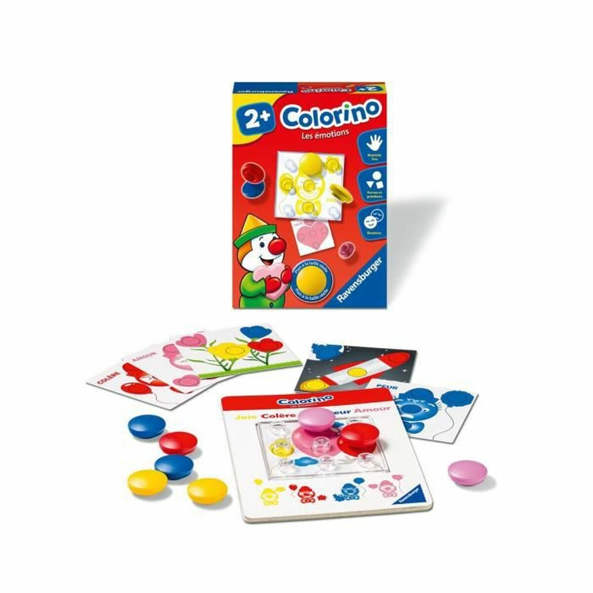 Una scatola di giochi per bambini e pezzi del gioco sono sparsi su una superficie bianca.