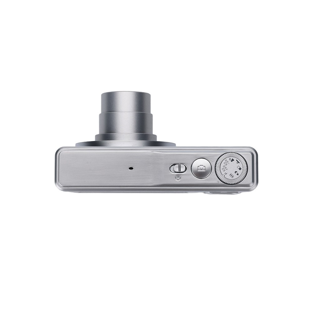 Srebrny aparat fotograficzny z góry. Ma obiektyw, przycisk i pokrętło.