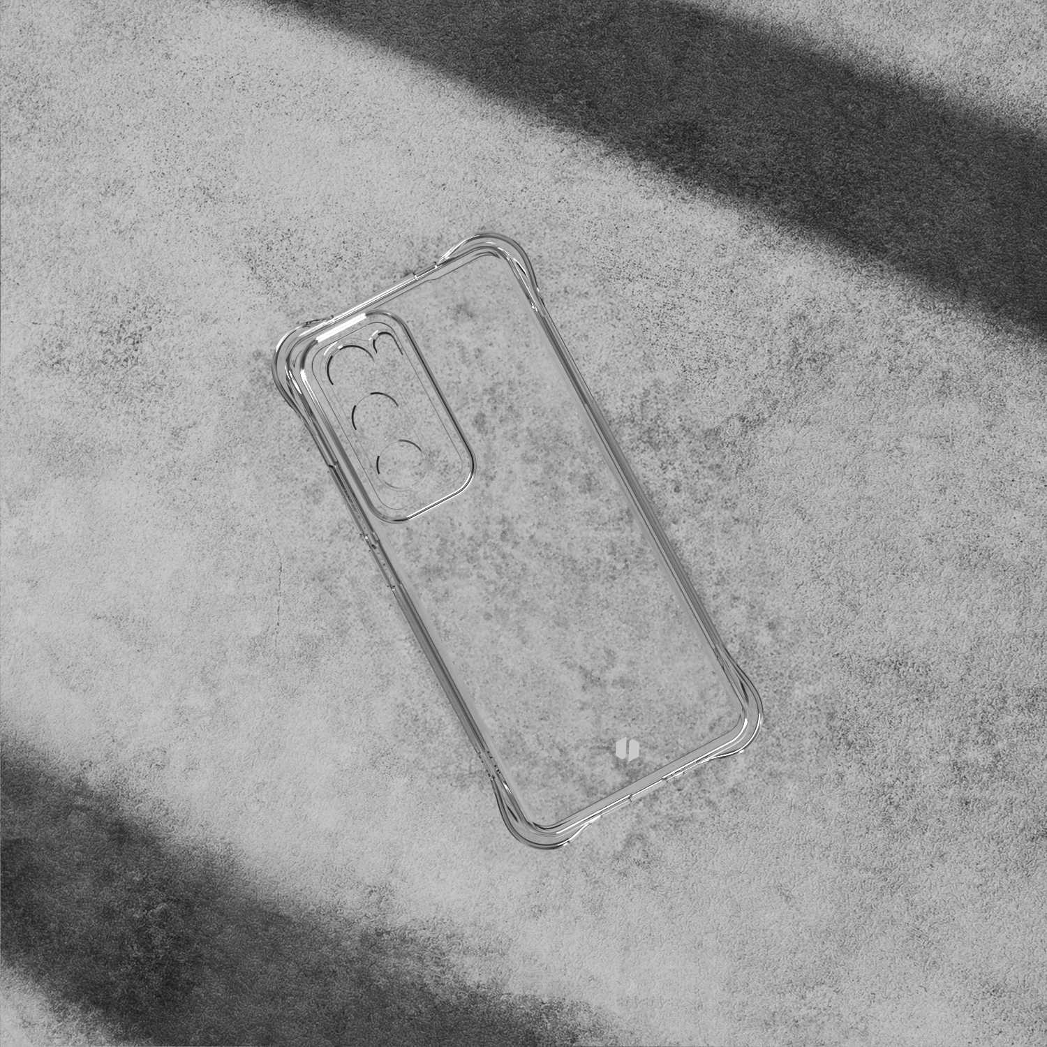 Przezroczyste etui na telefon na szarej powierzchni.