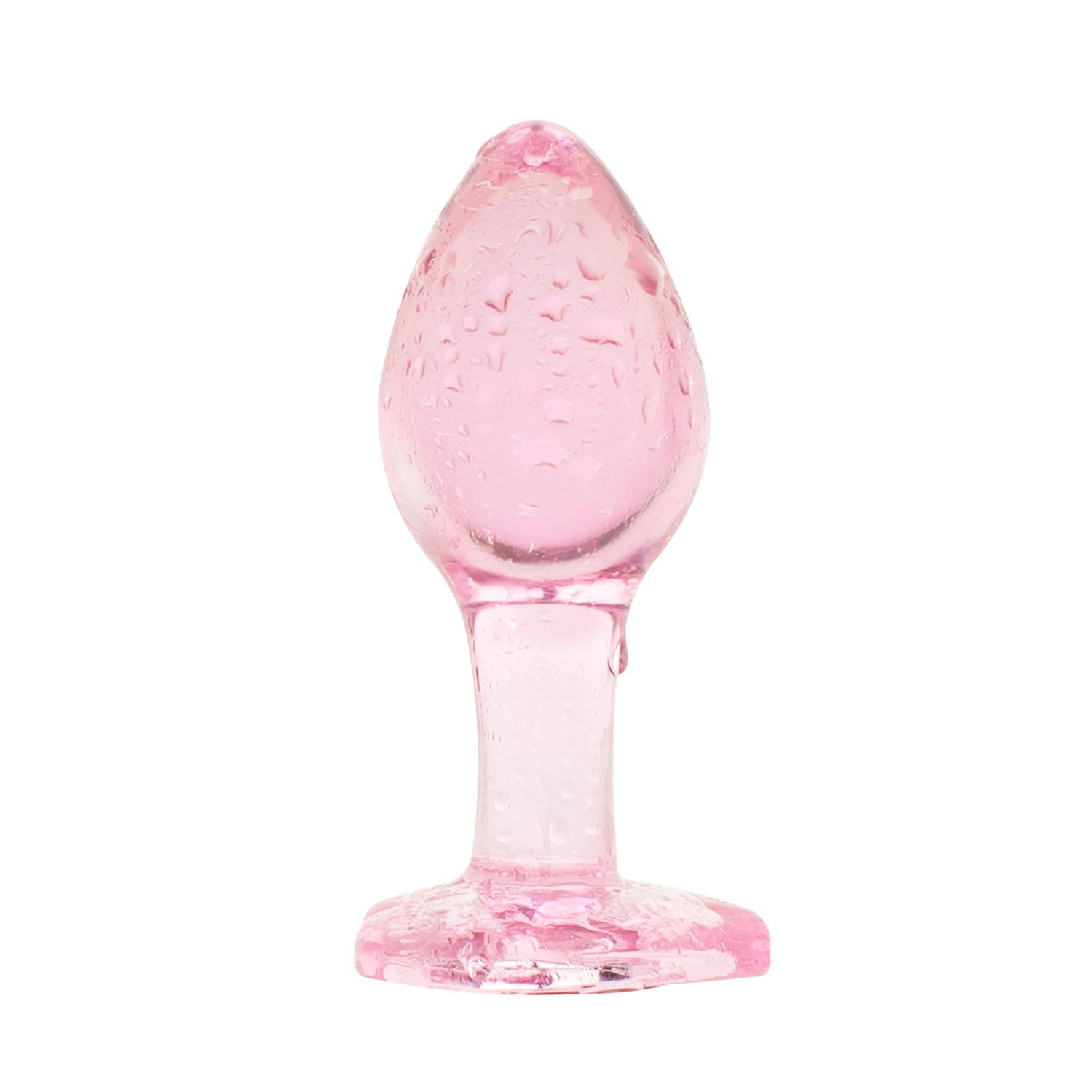 Rosa, tropfenförmiger Analknopf mit Wassertröpfchen auf der Oberfläche, aufrecht stehend.